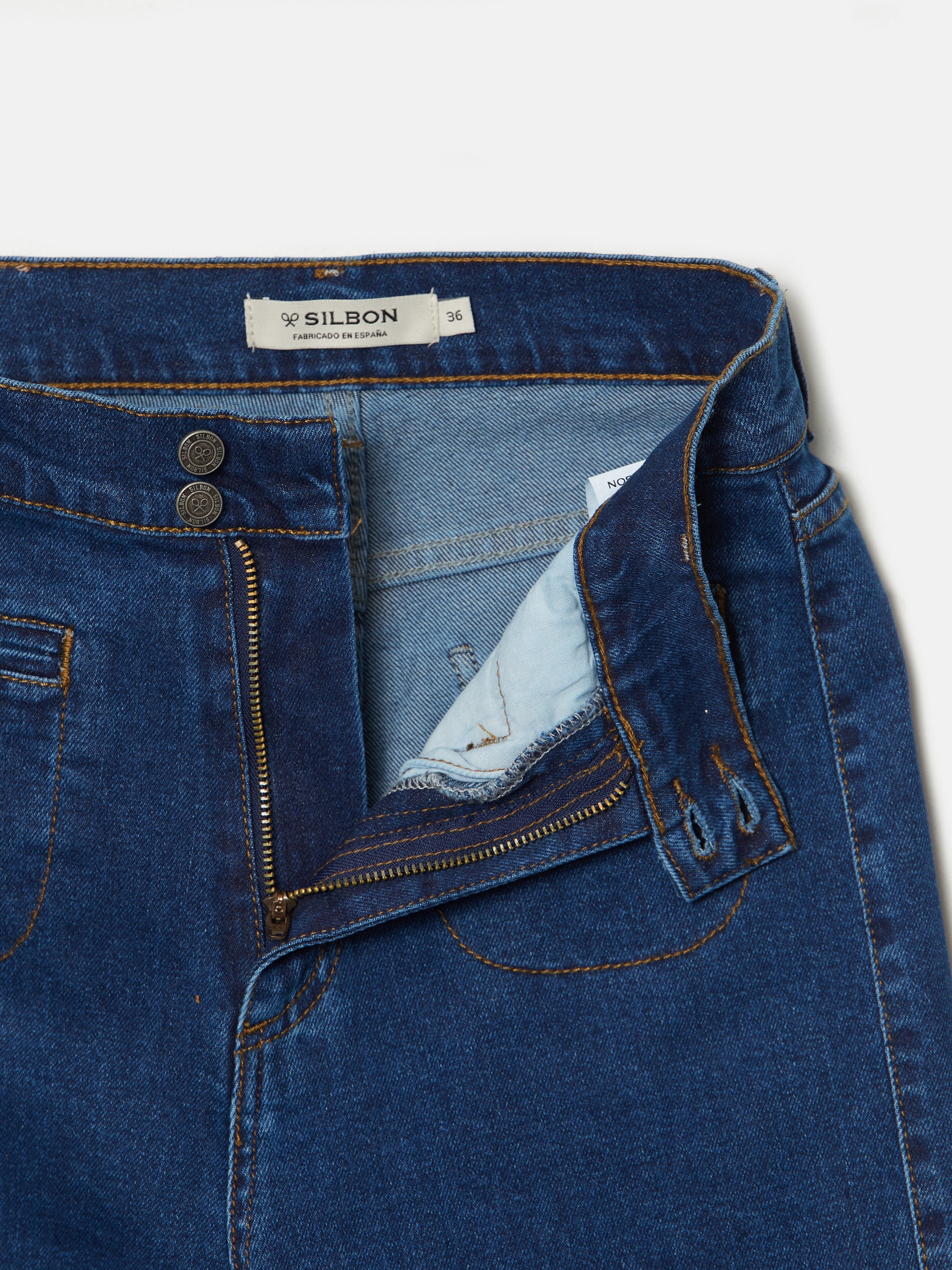 Flared denim trousers with pockets