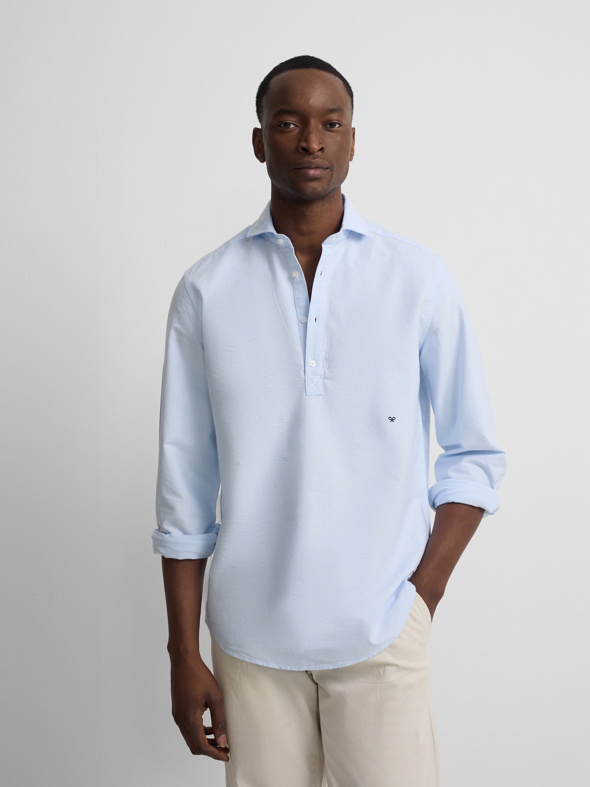 Polera sport oxford celeste