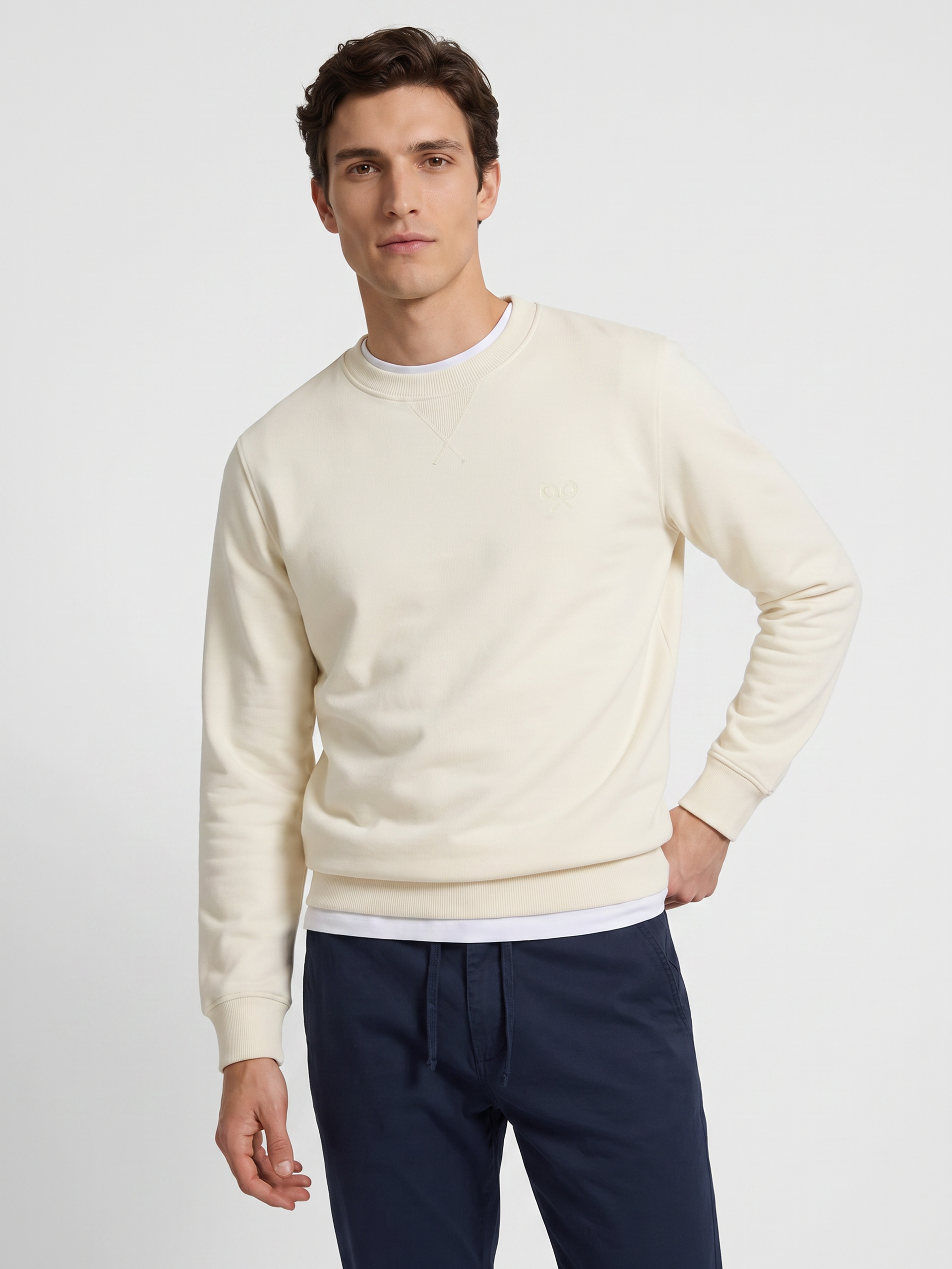 Cream embossed racket sweatshirt