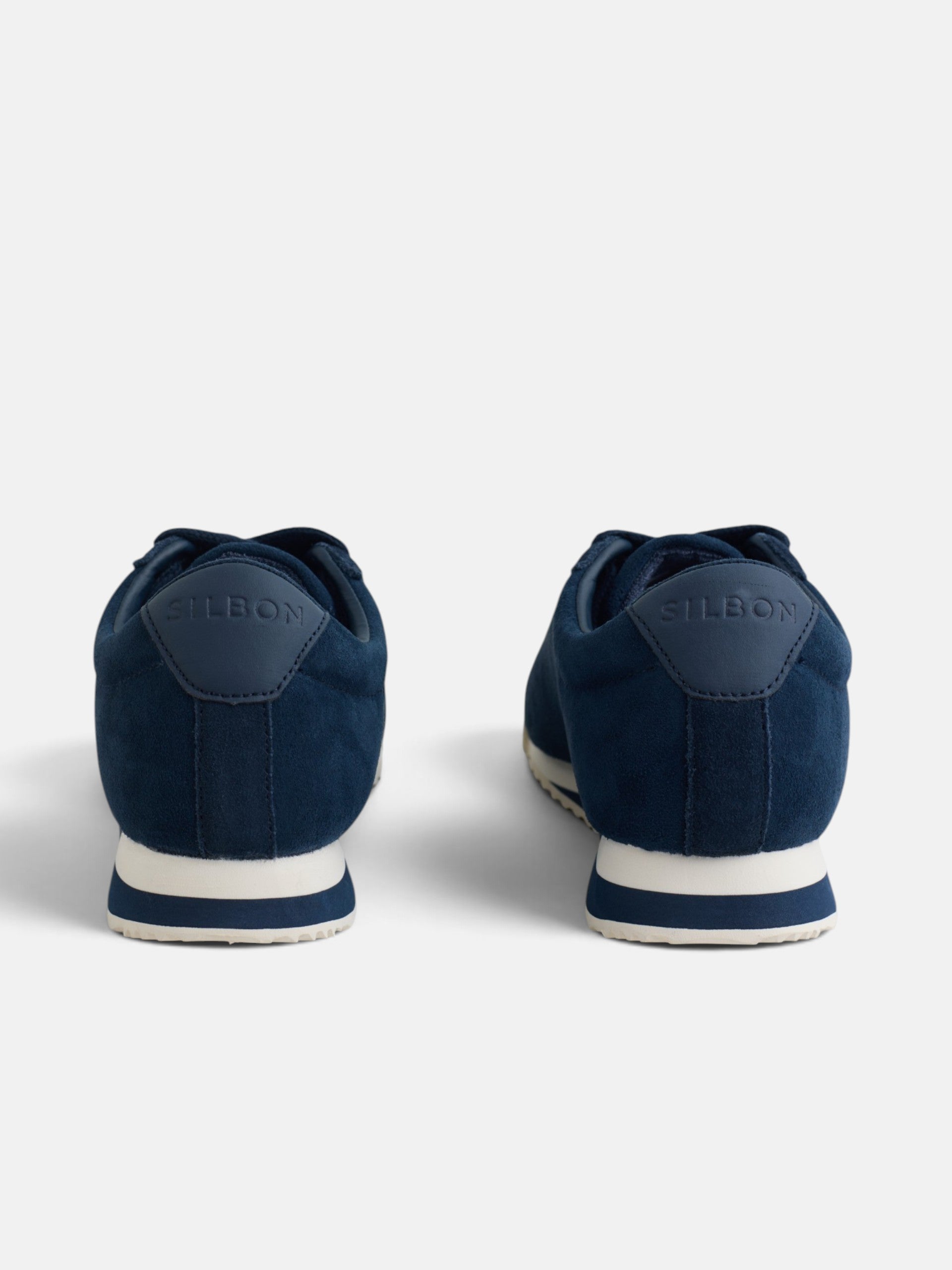 Baskets en daim logo perforé bleu marine