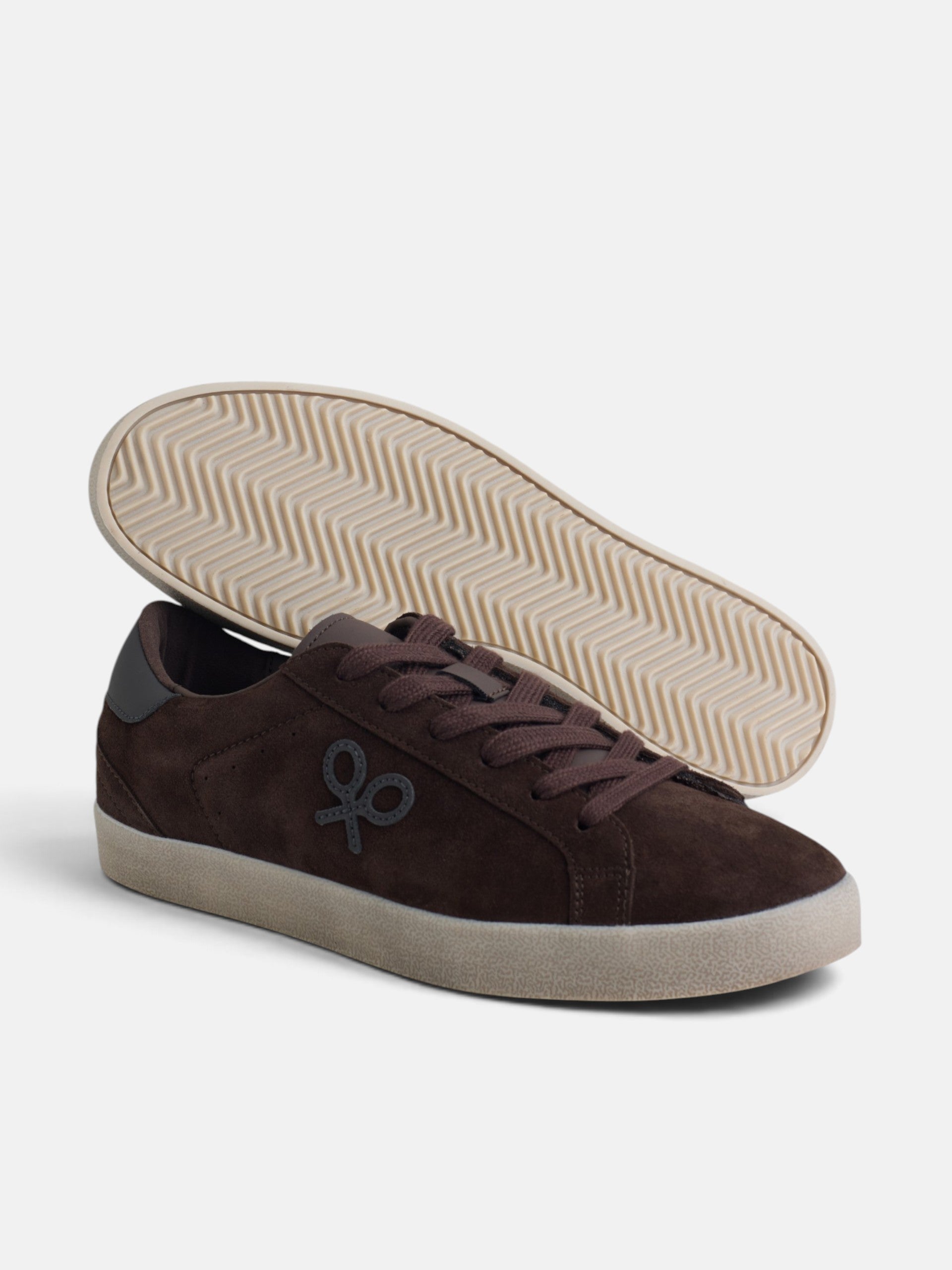 Worn brown suede sneaker