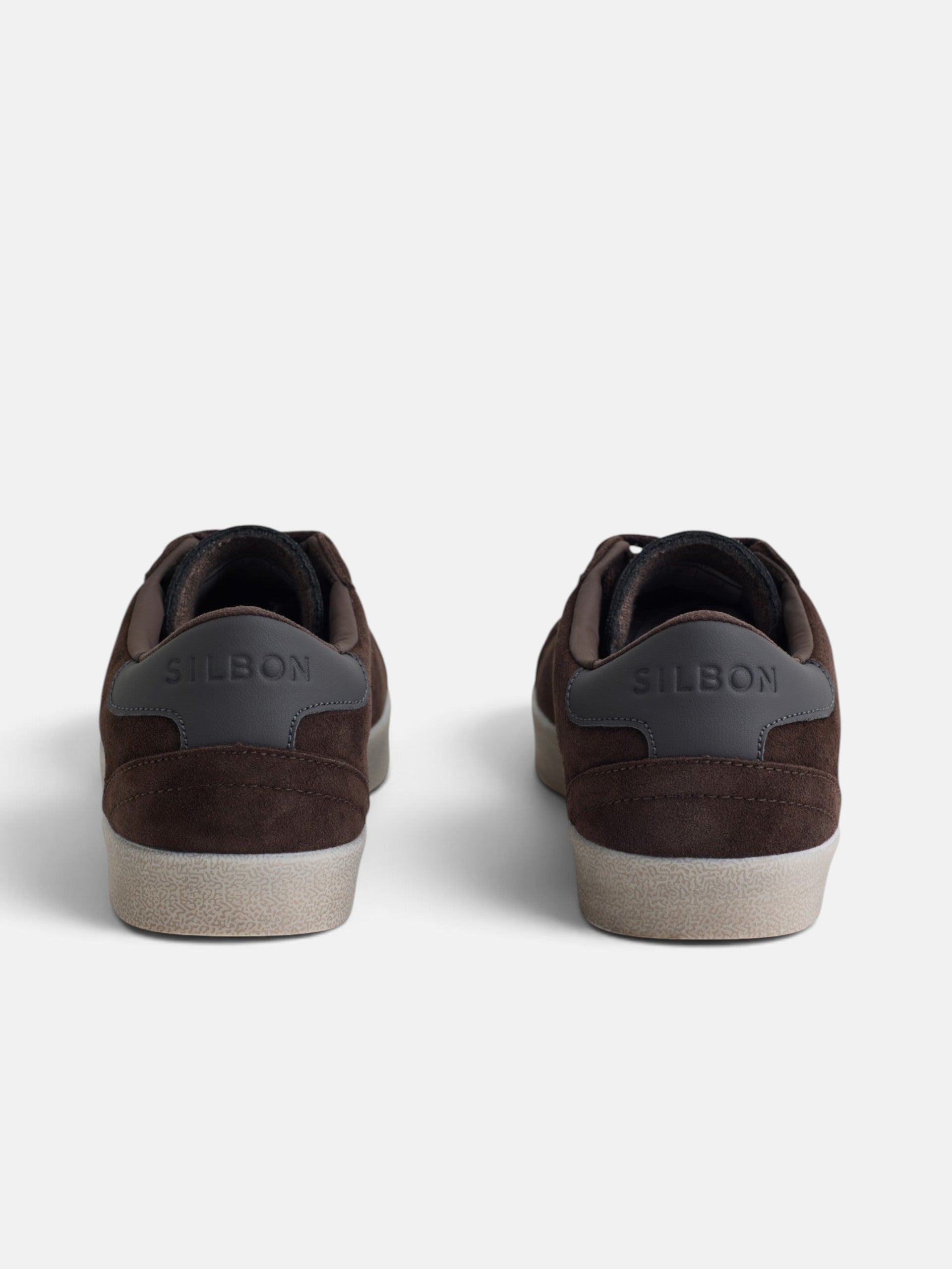 Worn brown suede sneaker
