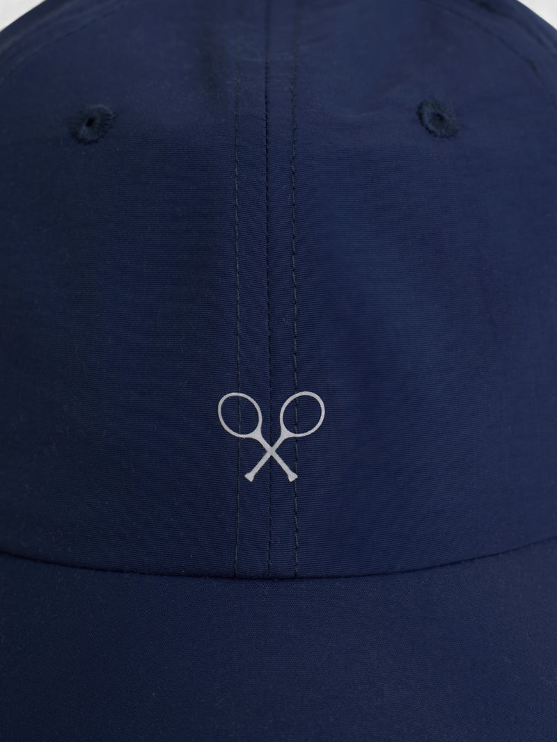 Navy blue technical fabric racket cap