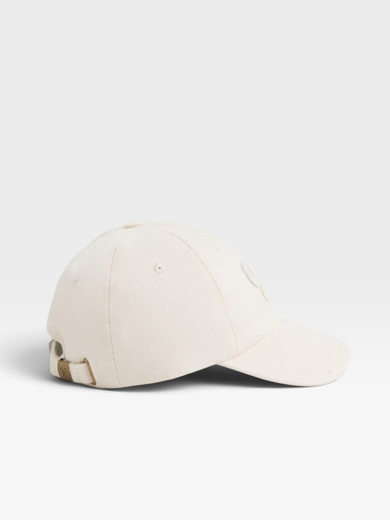 Gorra raqueta relieve beige