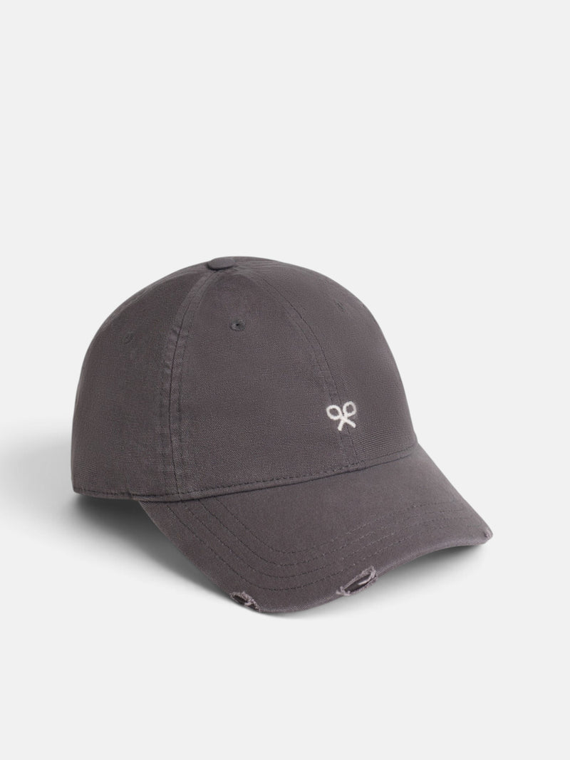 Brown cap with embroidered rackets