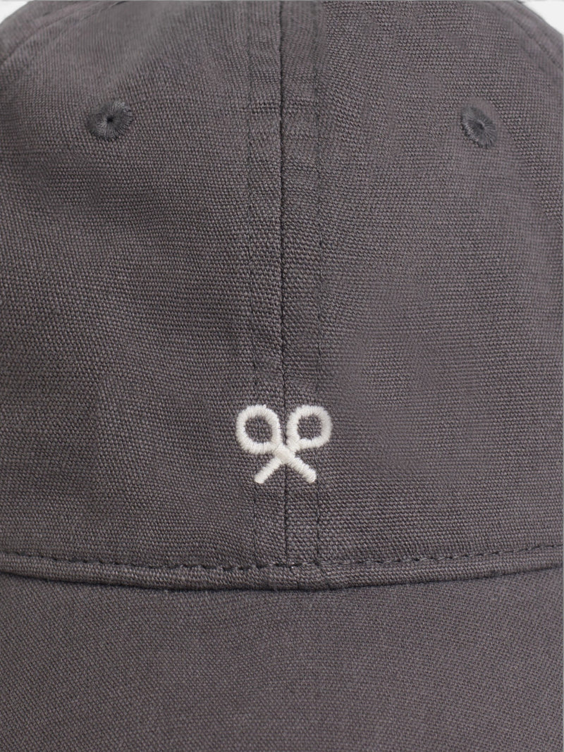 Brown cap with embroidered rackets