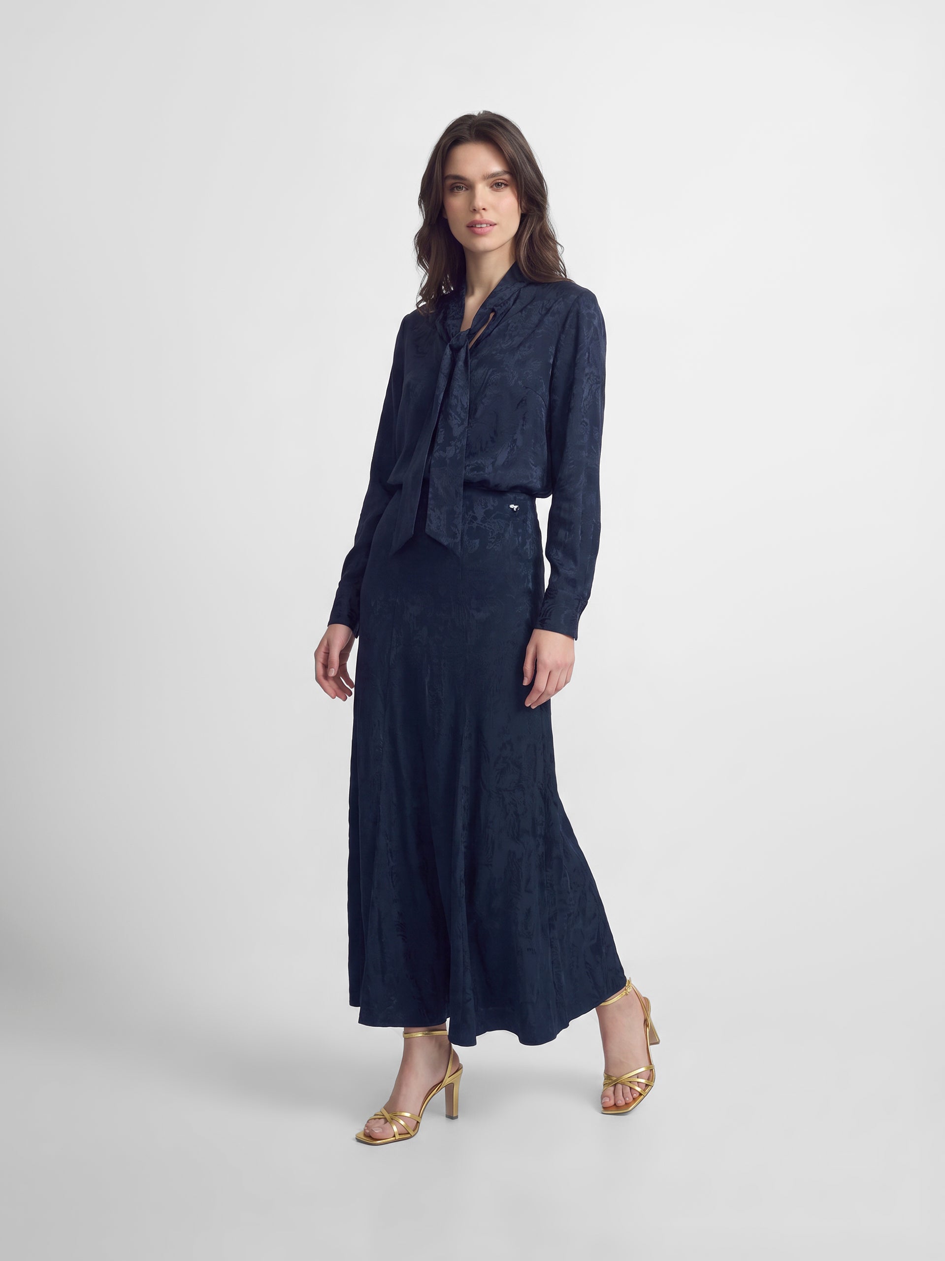 Blue jacquard neck strap blouse
