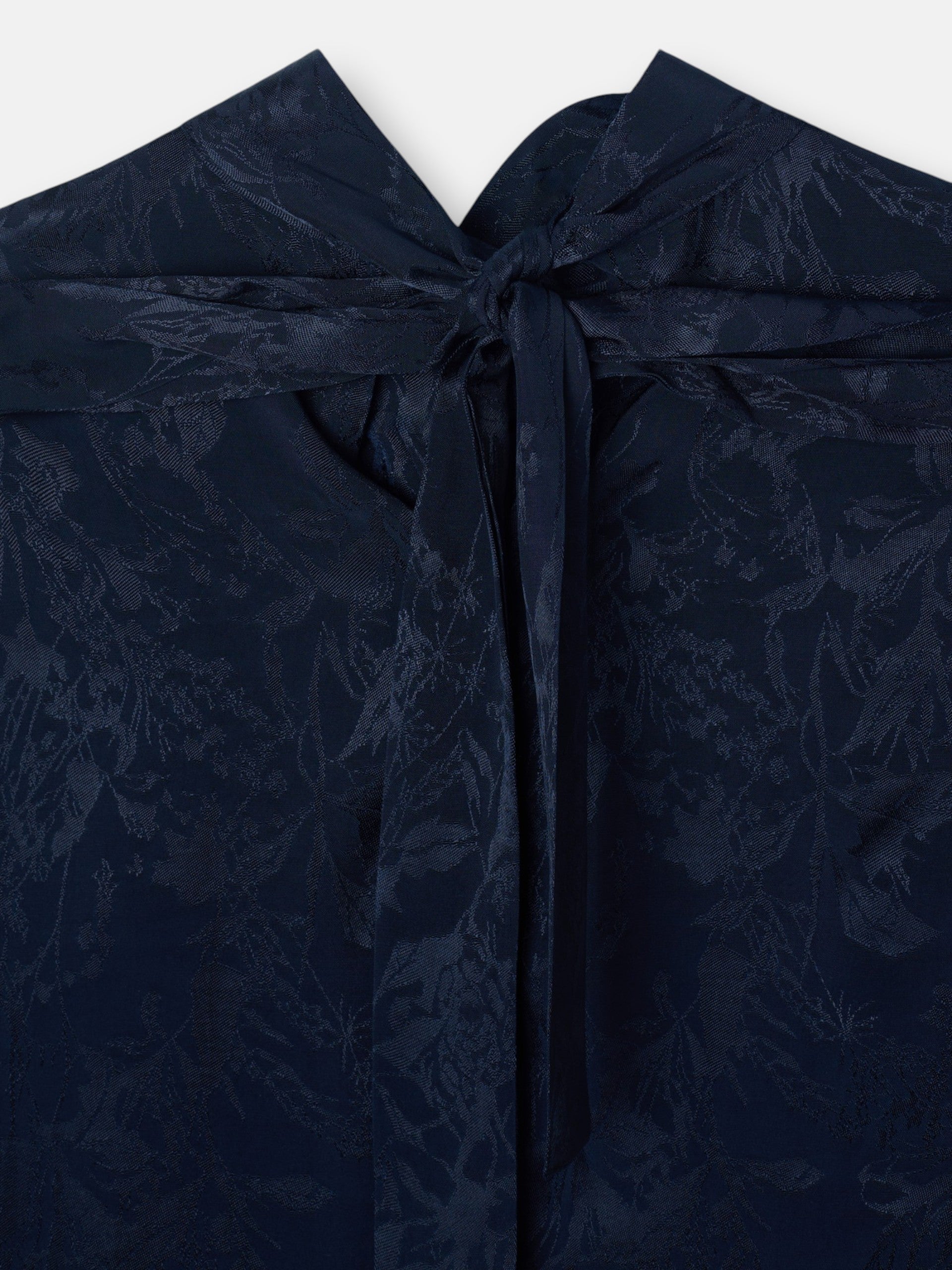 Blue jacquard neck strap blouse