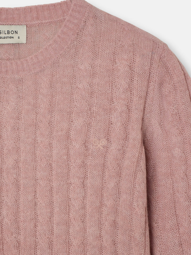 Pull torsadé à col rond rose