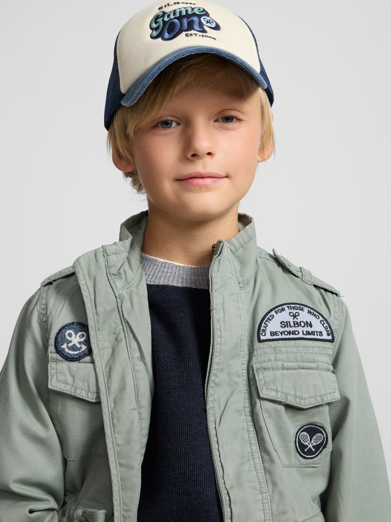 Veste militaire enfant à écussons verte