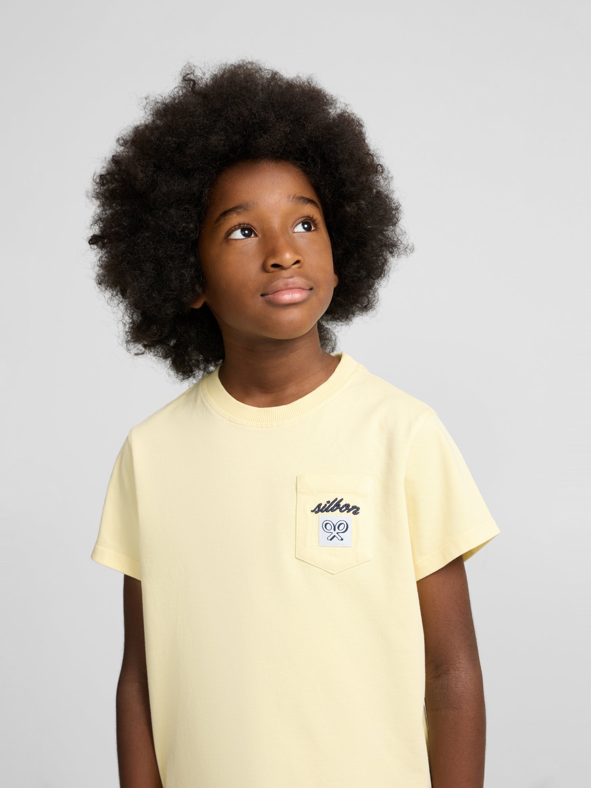 Kids T-shirt with yellow label pocket