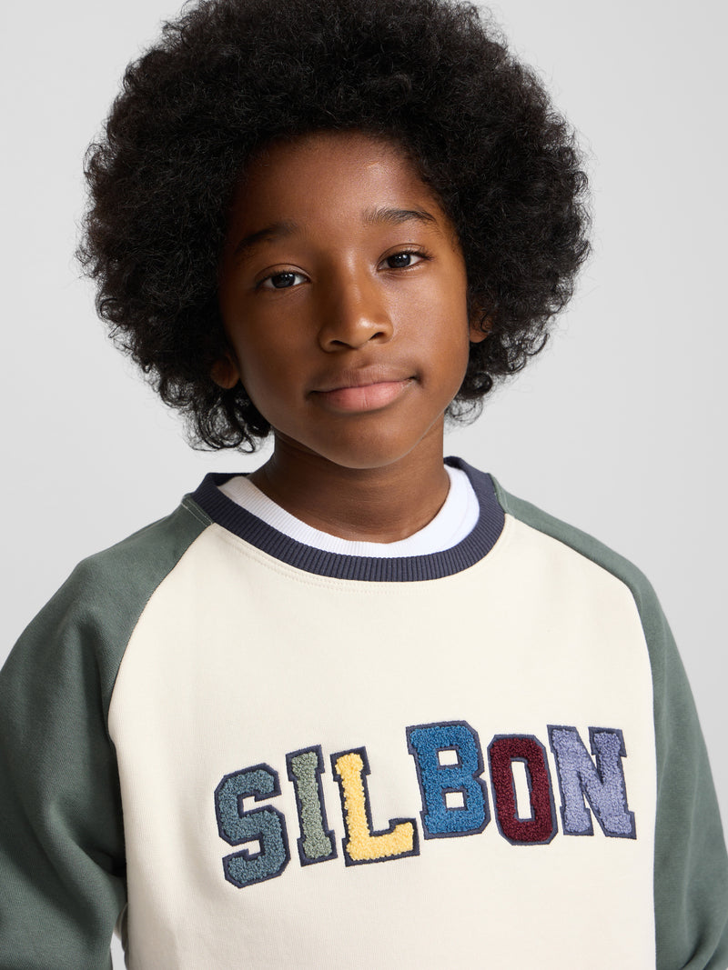 Kids green raglan varsity sweatshirt