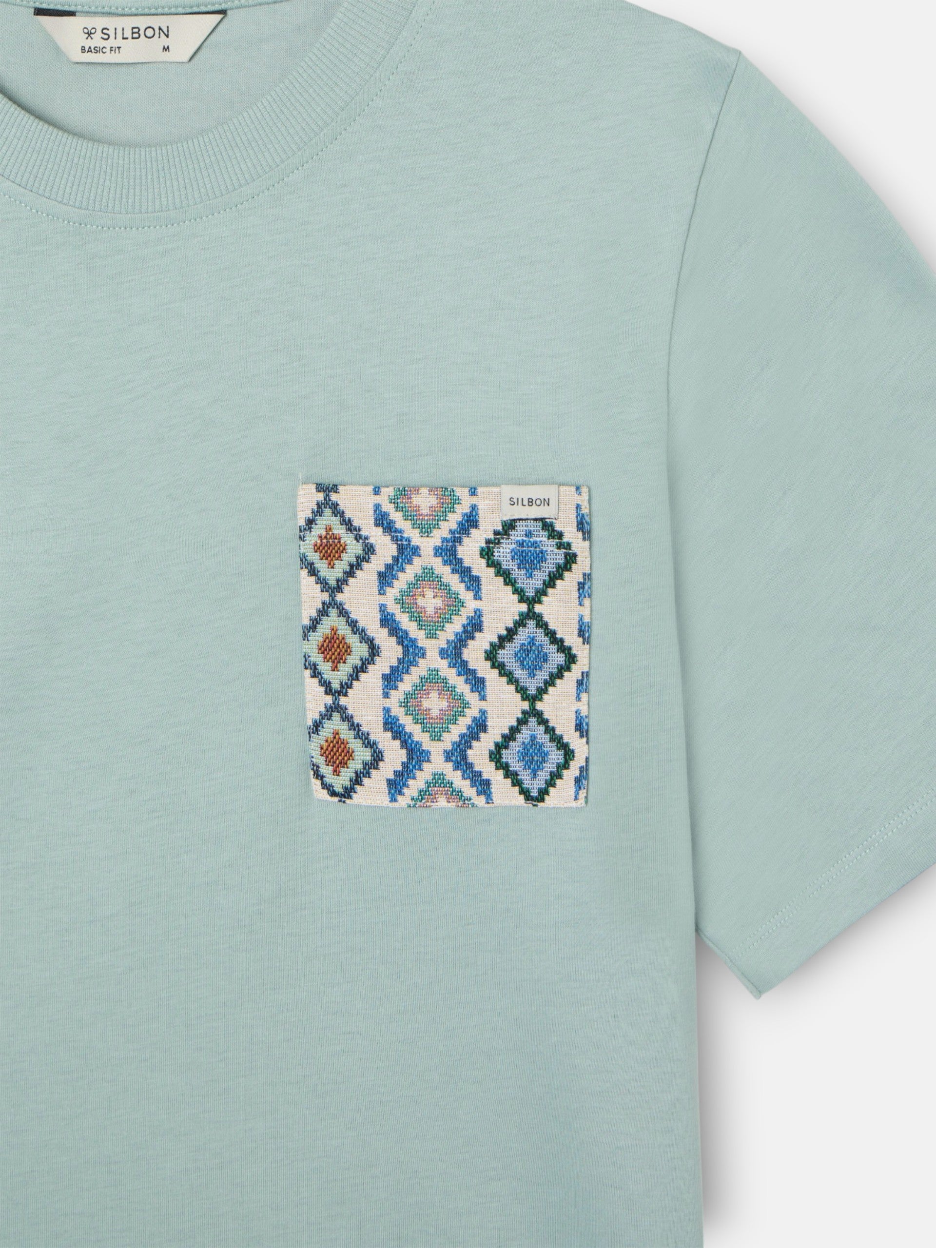 T-shirt poche ethnique verte