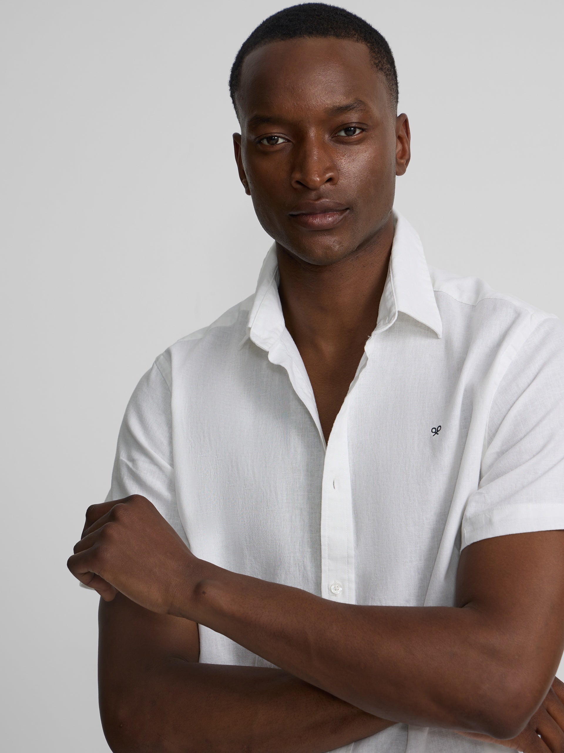 White short-sleeved linen shirt
