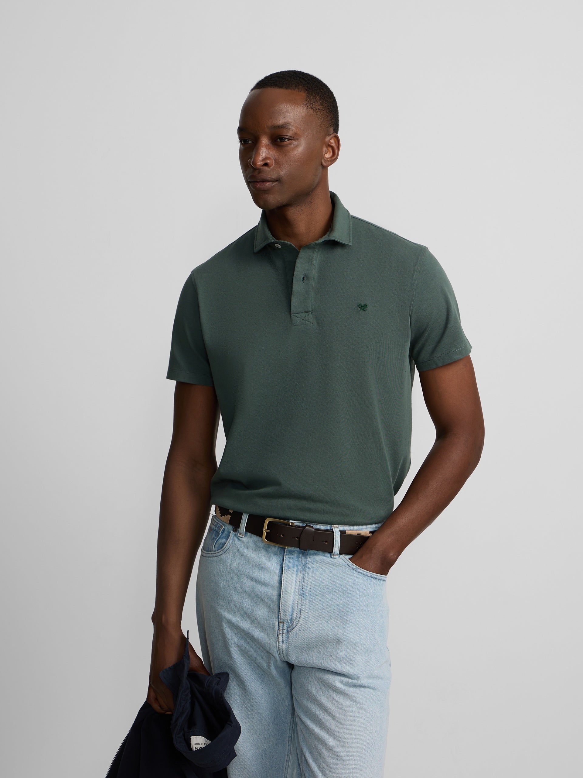Polo manga corta logo relieve verde