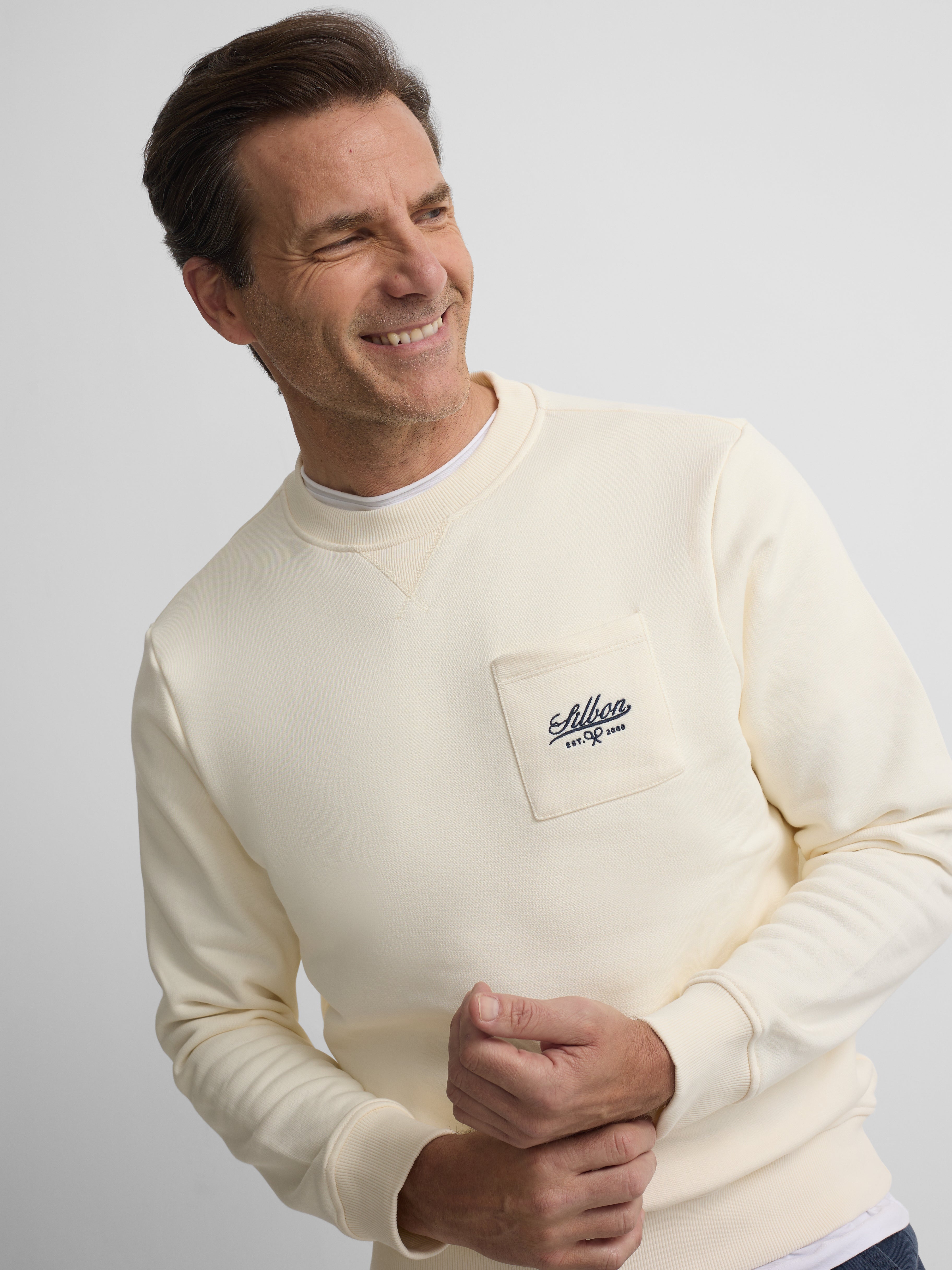 Cream sweatshirt with embroidered pocket