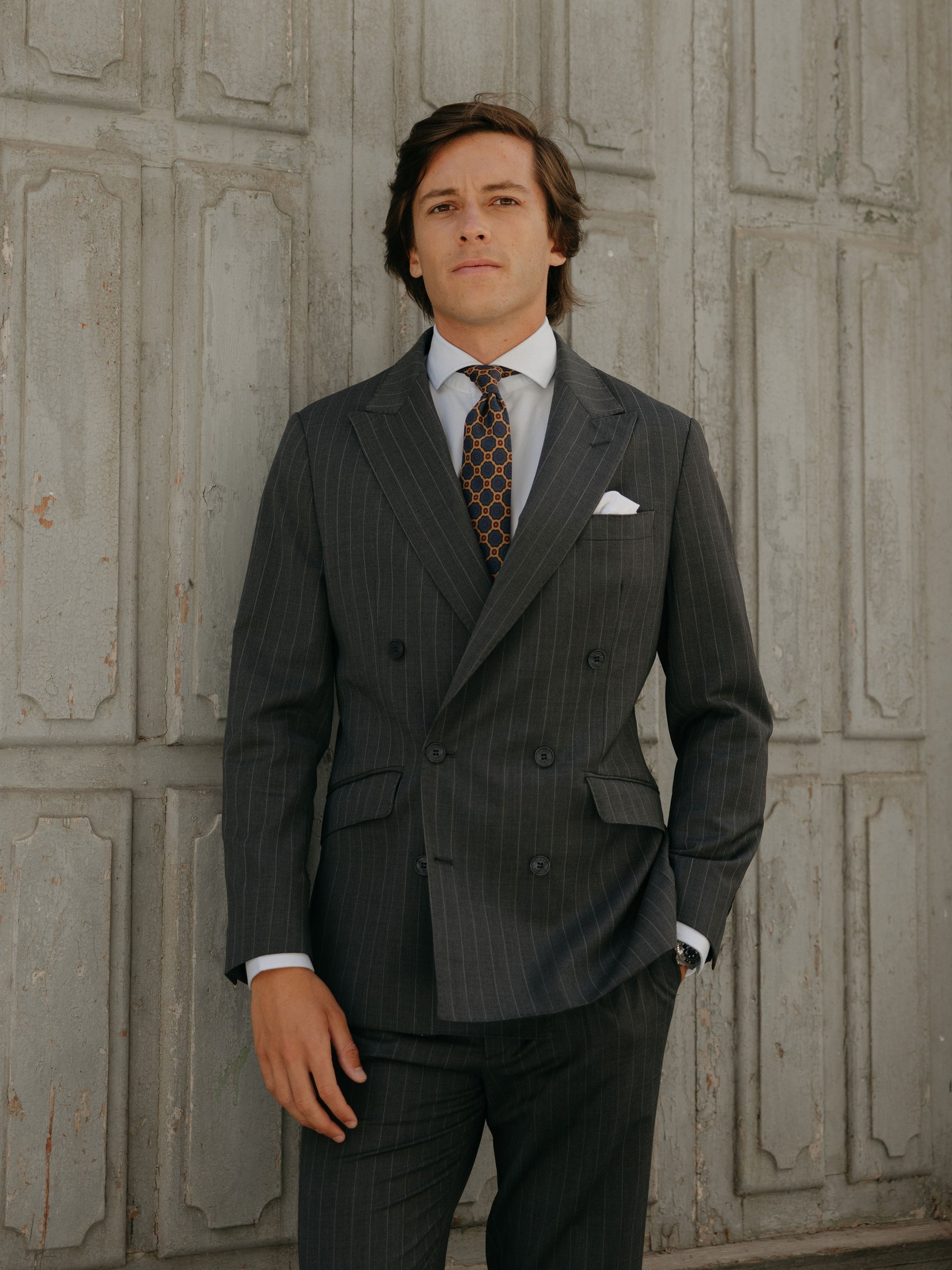 Grey pinstripe double-breasted suit jacket