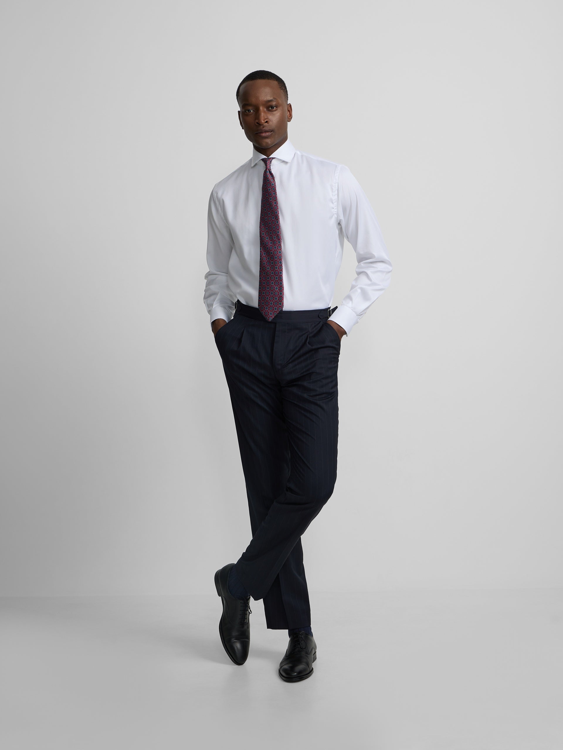 Navy blue pinstripe suit trousers