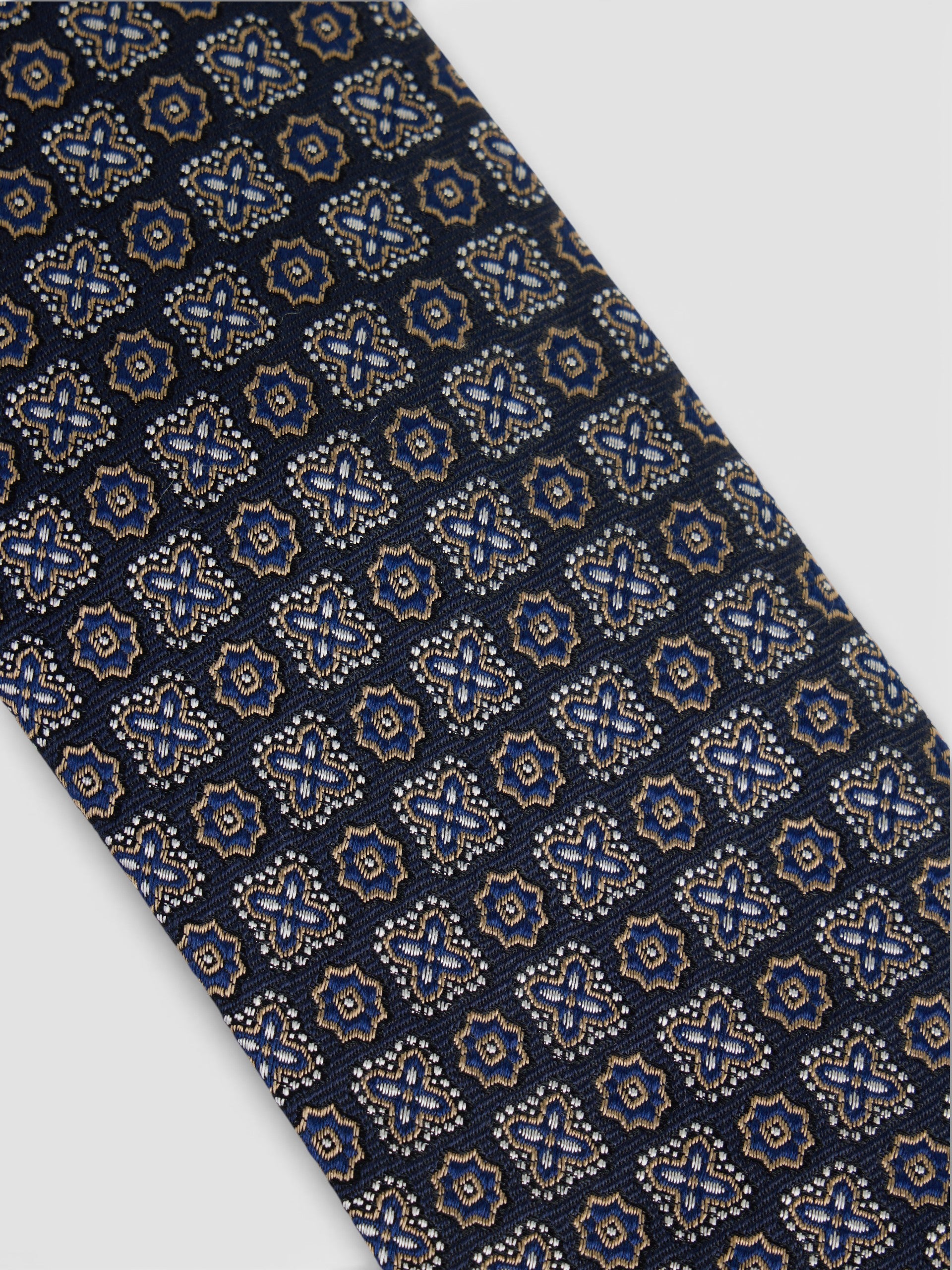 Cravate motif fleur bleu marine