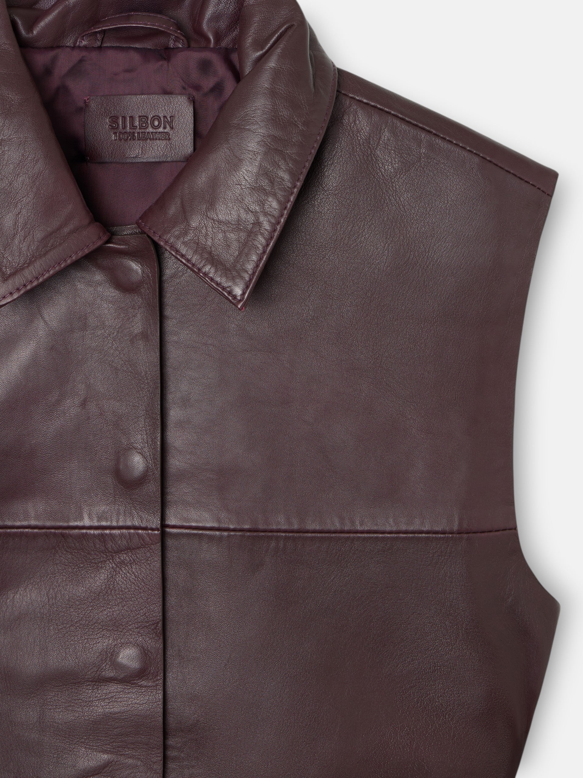 Braided burgundy leather vest