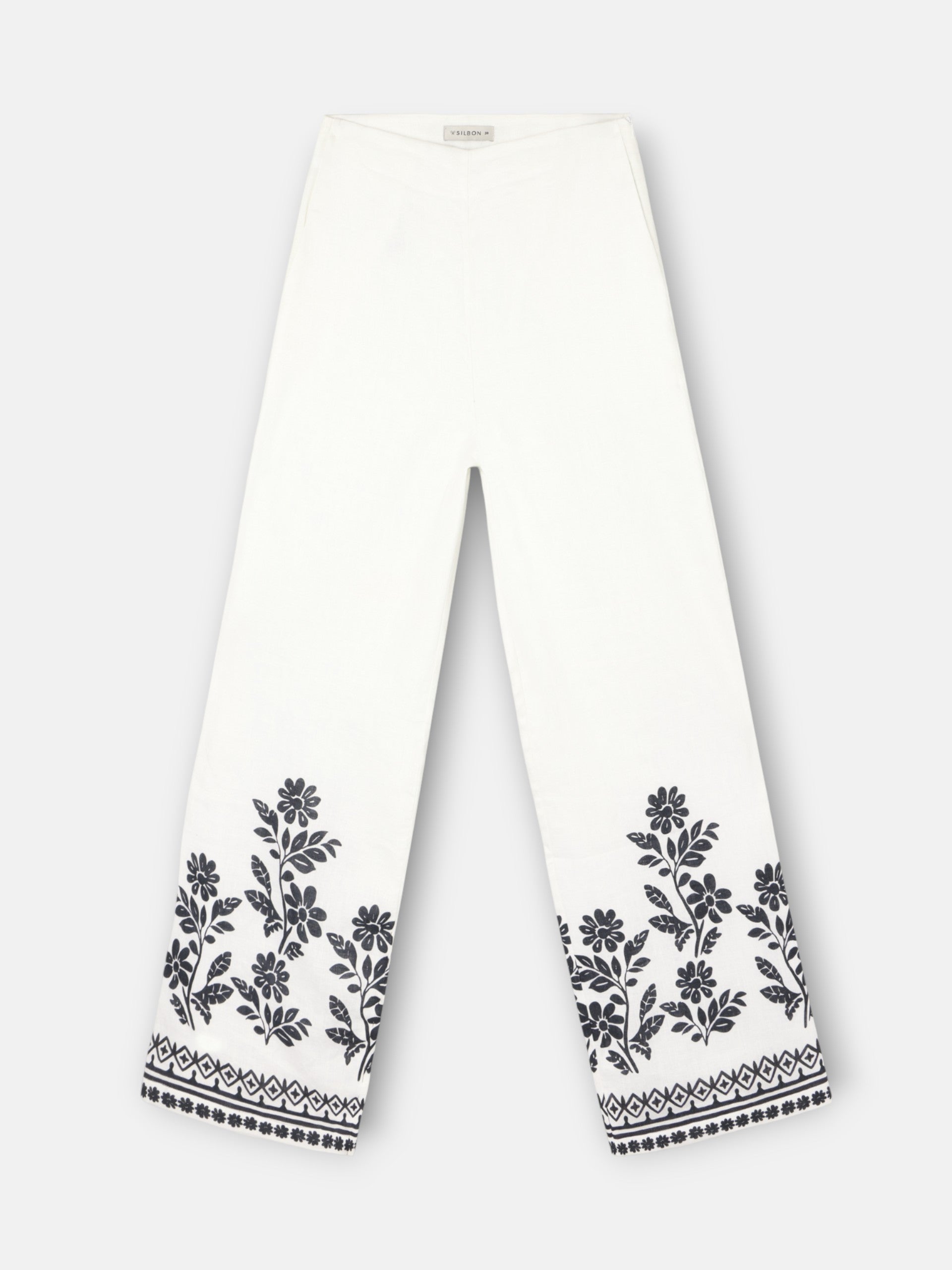 White floral print trousers
