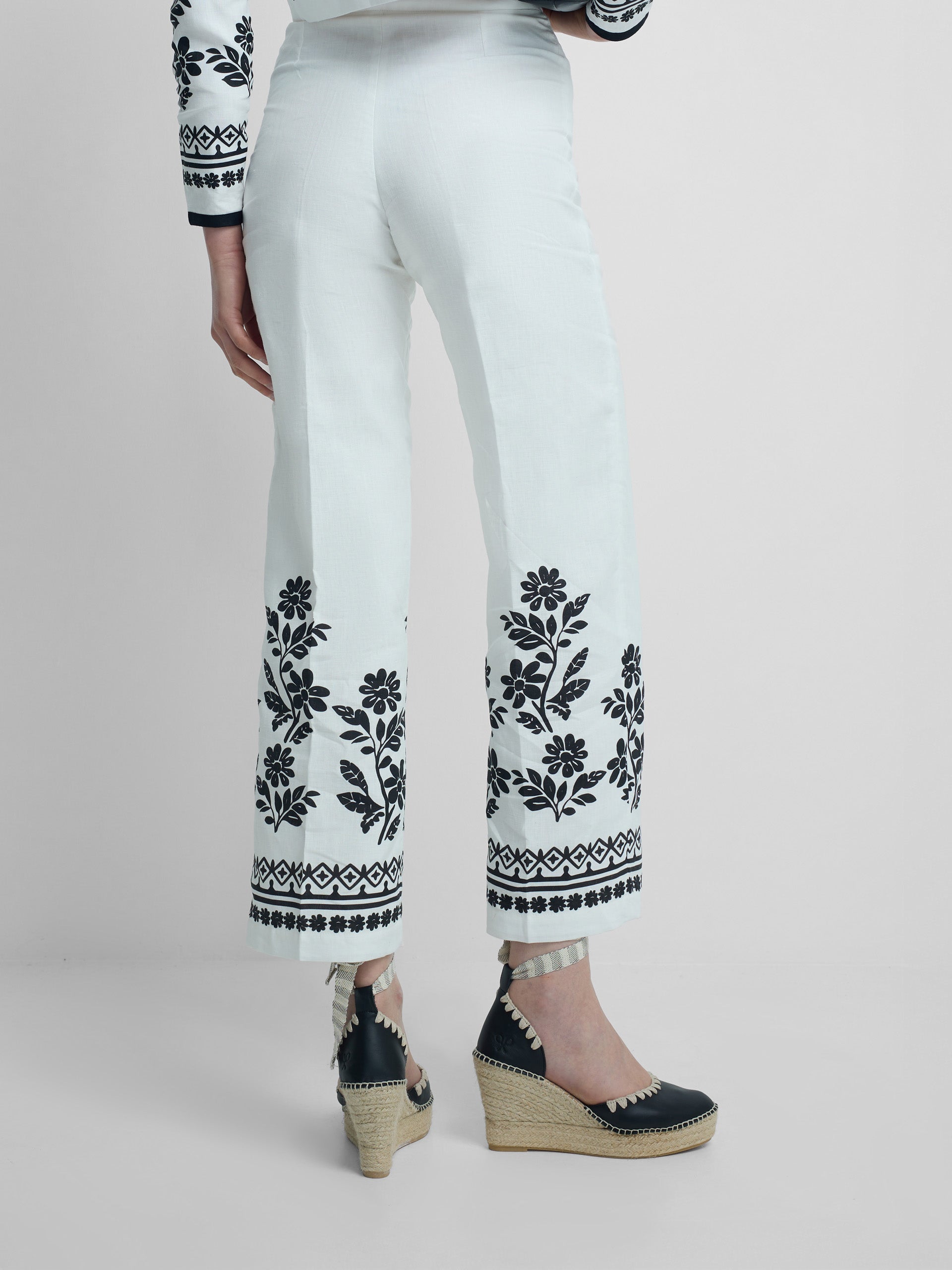 White floral print trousers