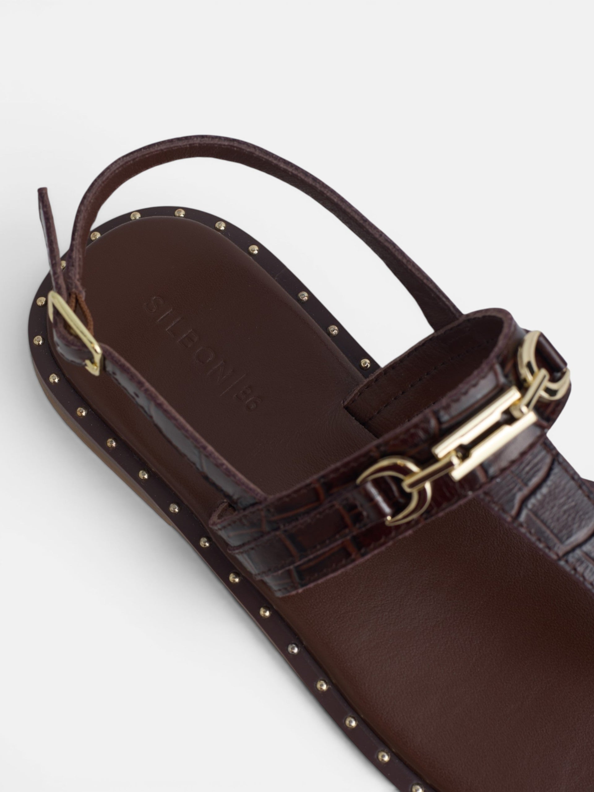 Brown sandal with metallic applique