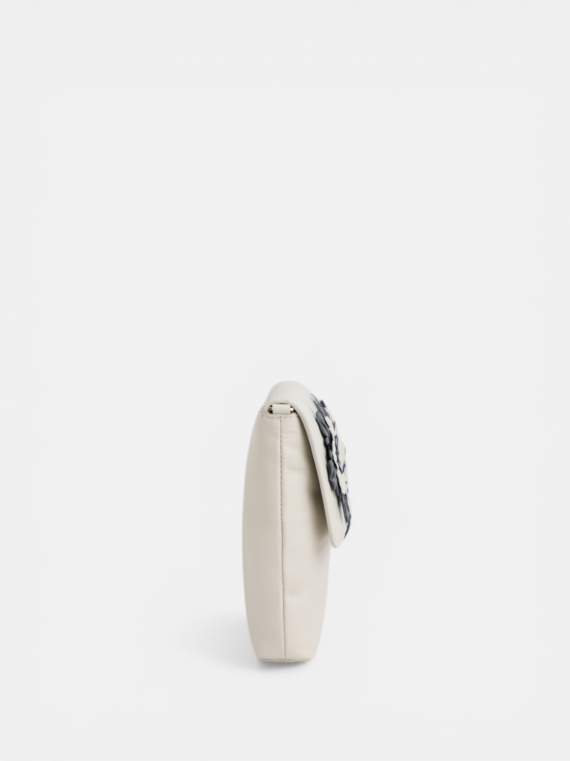 Bolso velada napa clutch crudo