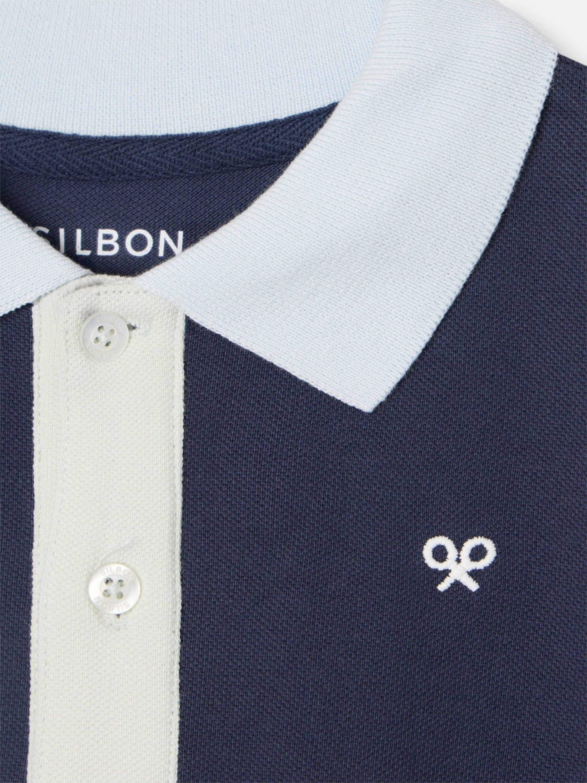 Polo enfant à liseré multicolore bleu marine
