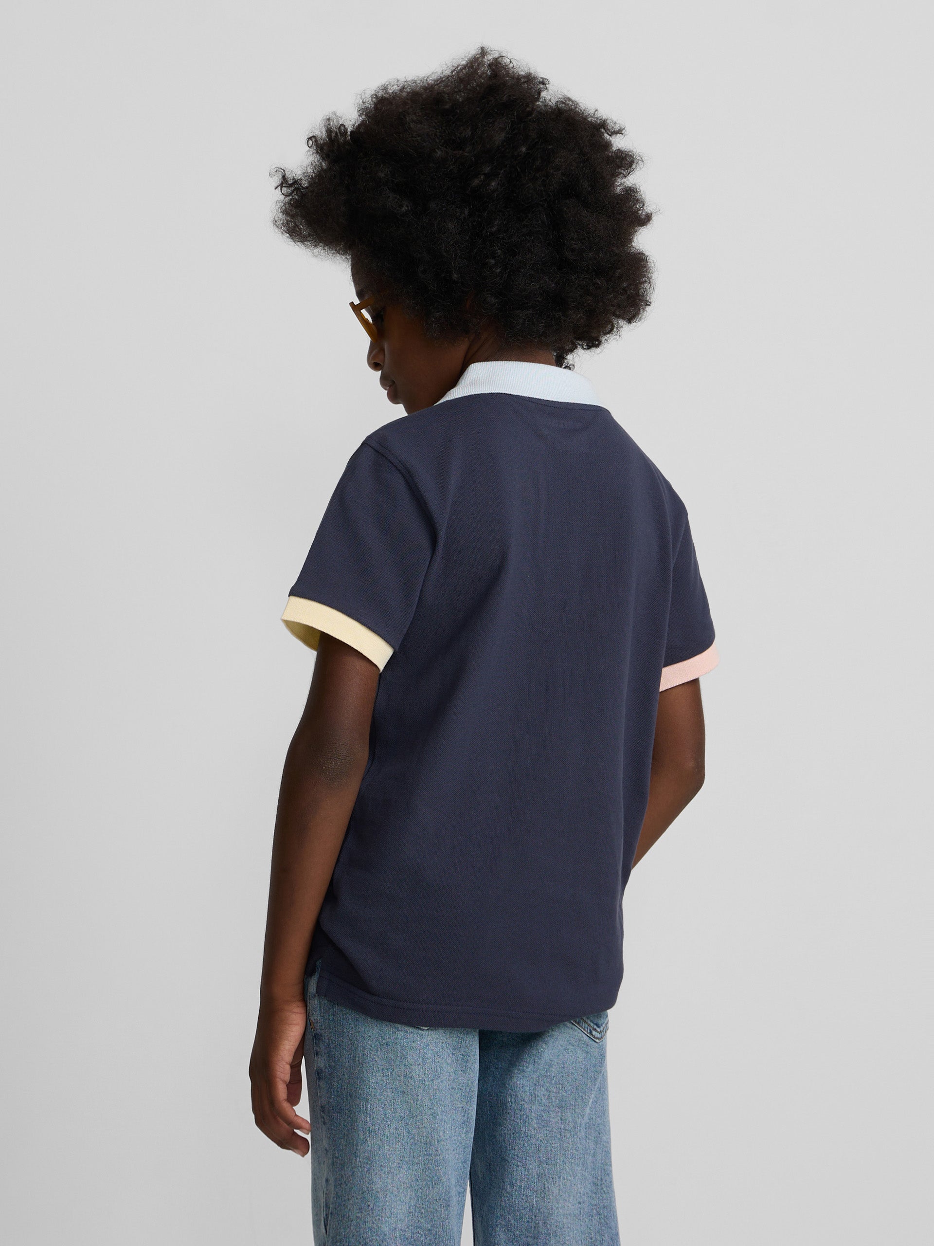Polo enfant à liseré multicolore bleu marine