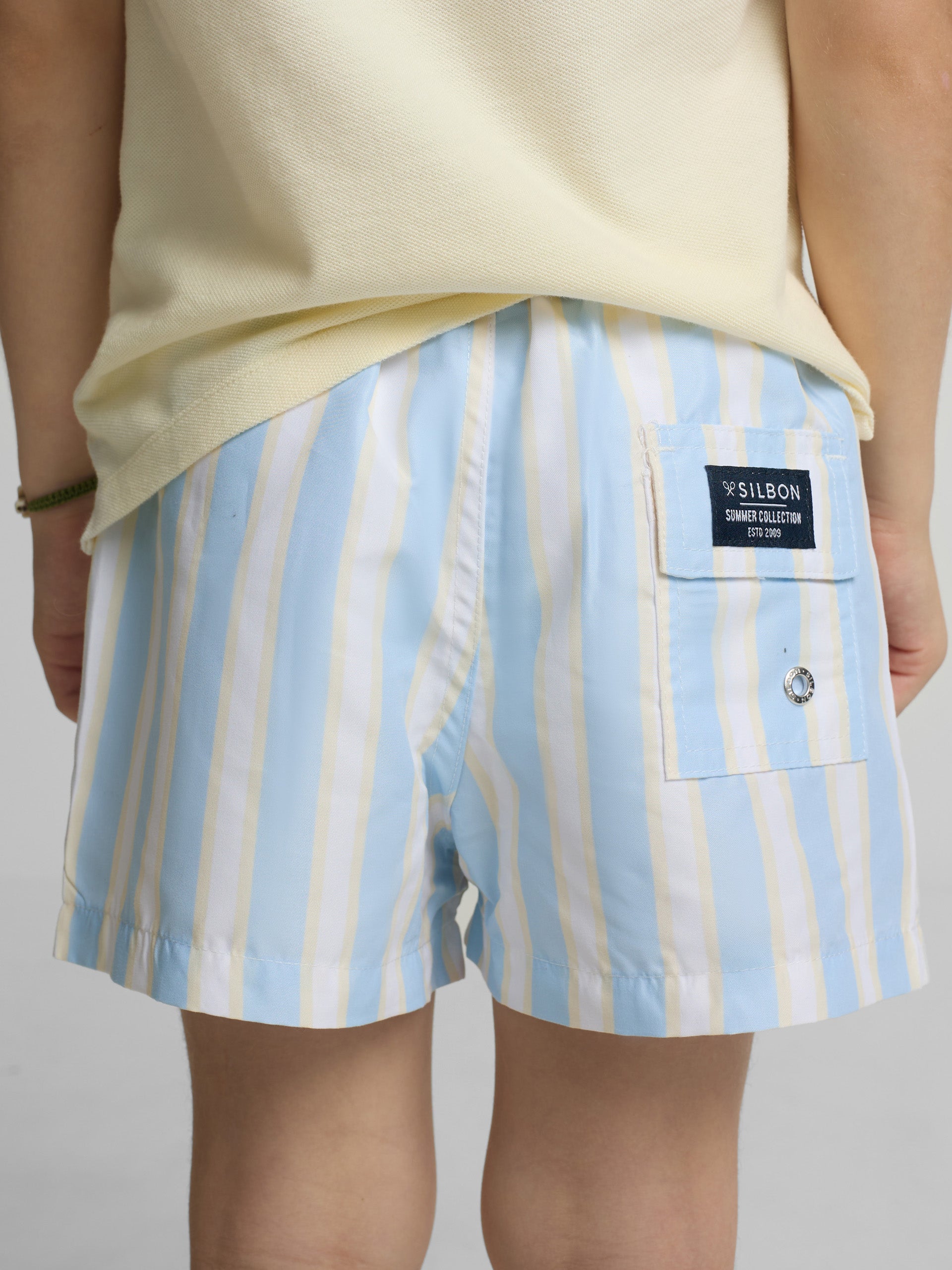Maillot de bain enfant à larges rayures jaune et bleu