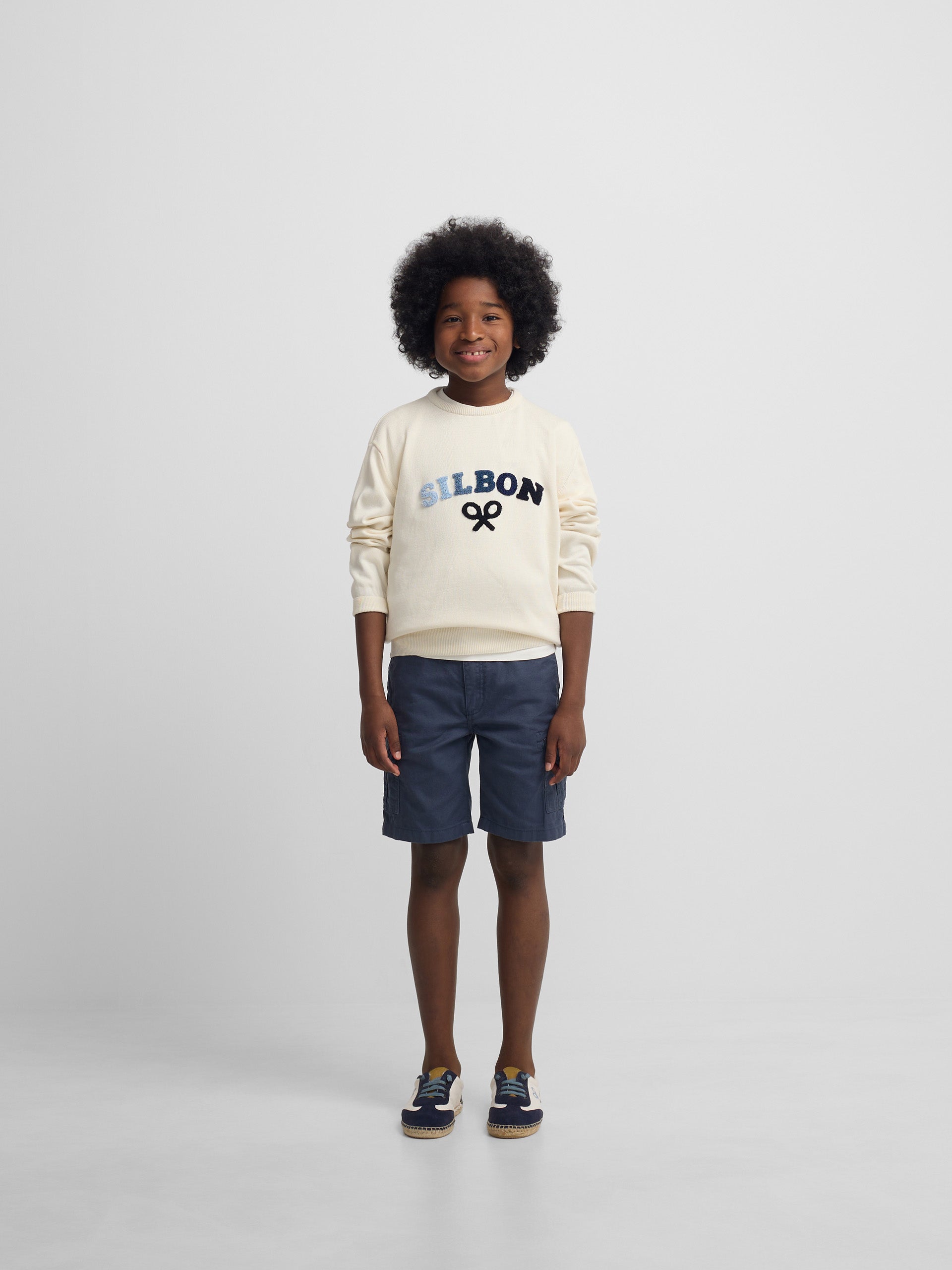Kids' sweater with colored letters in cream
