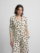 Blazer com lapelas de bolinhas preto