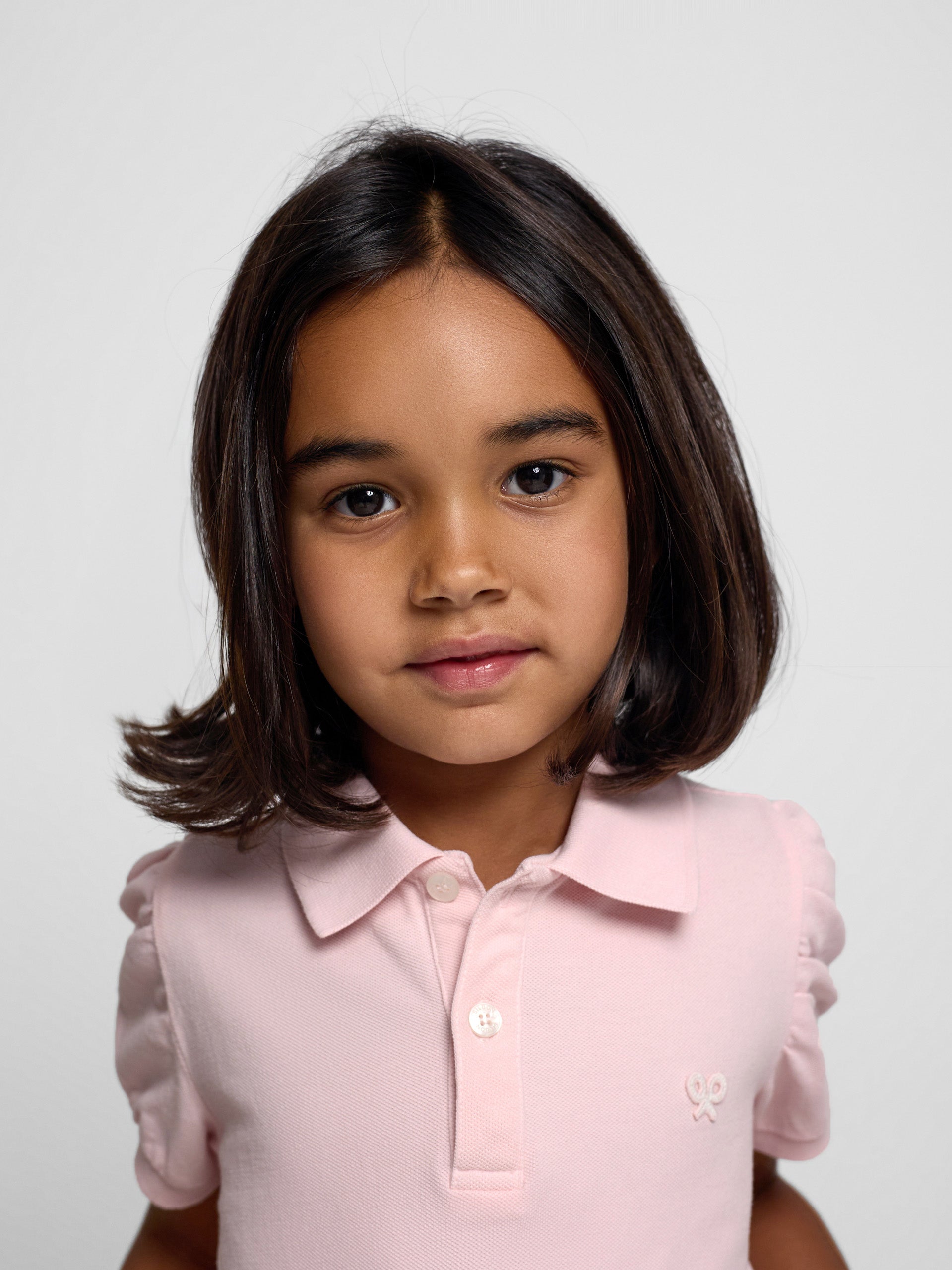 Polo de menina com manga bufante rosa claro