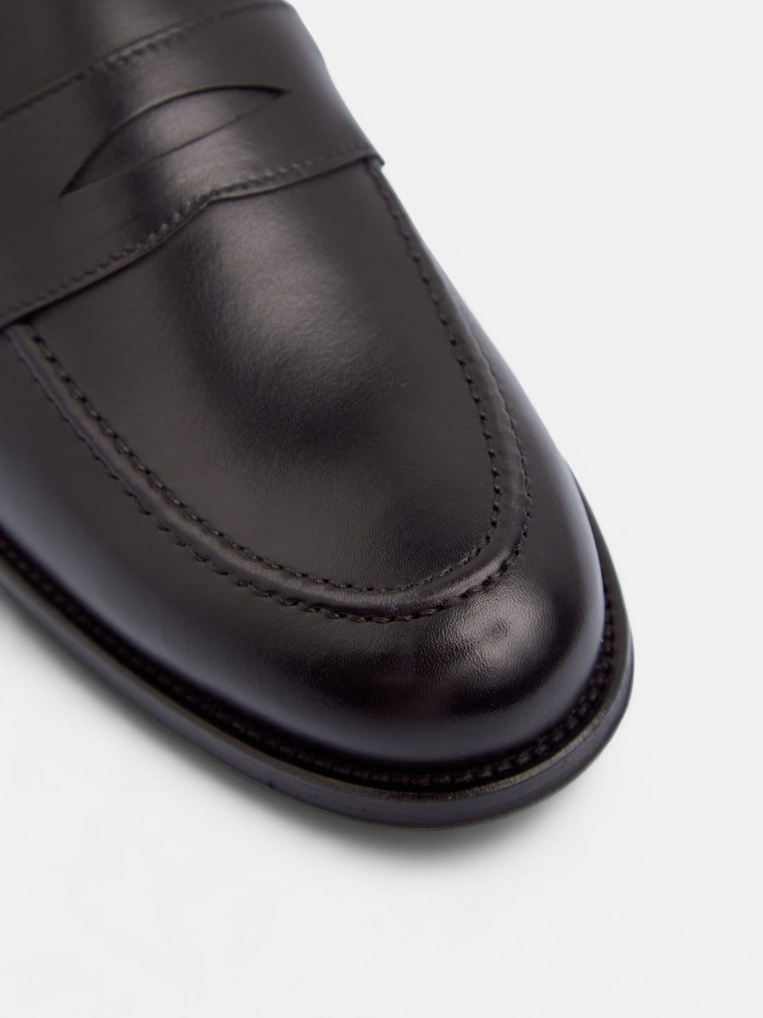 Black leather penny loafer