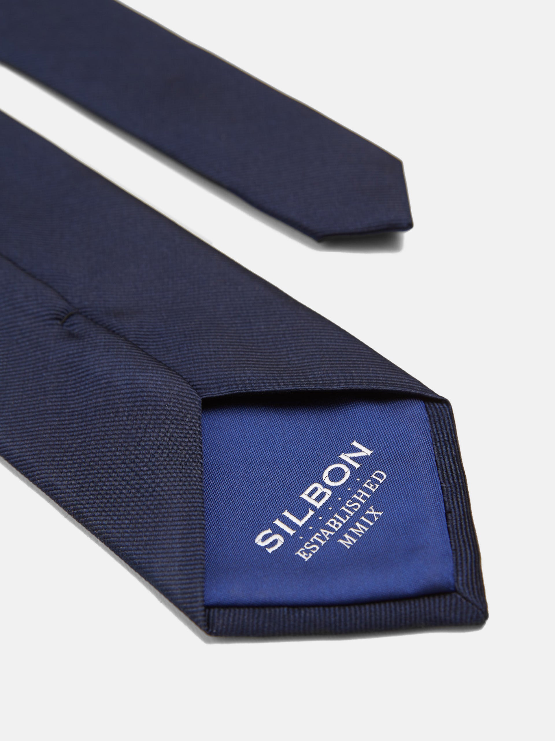 Corbata maxilogo azul marino