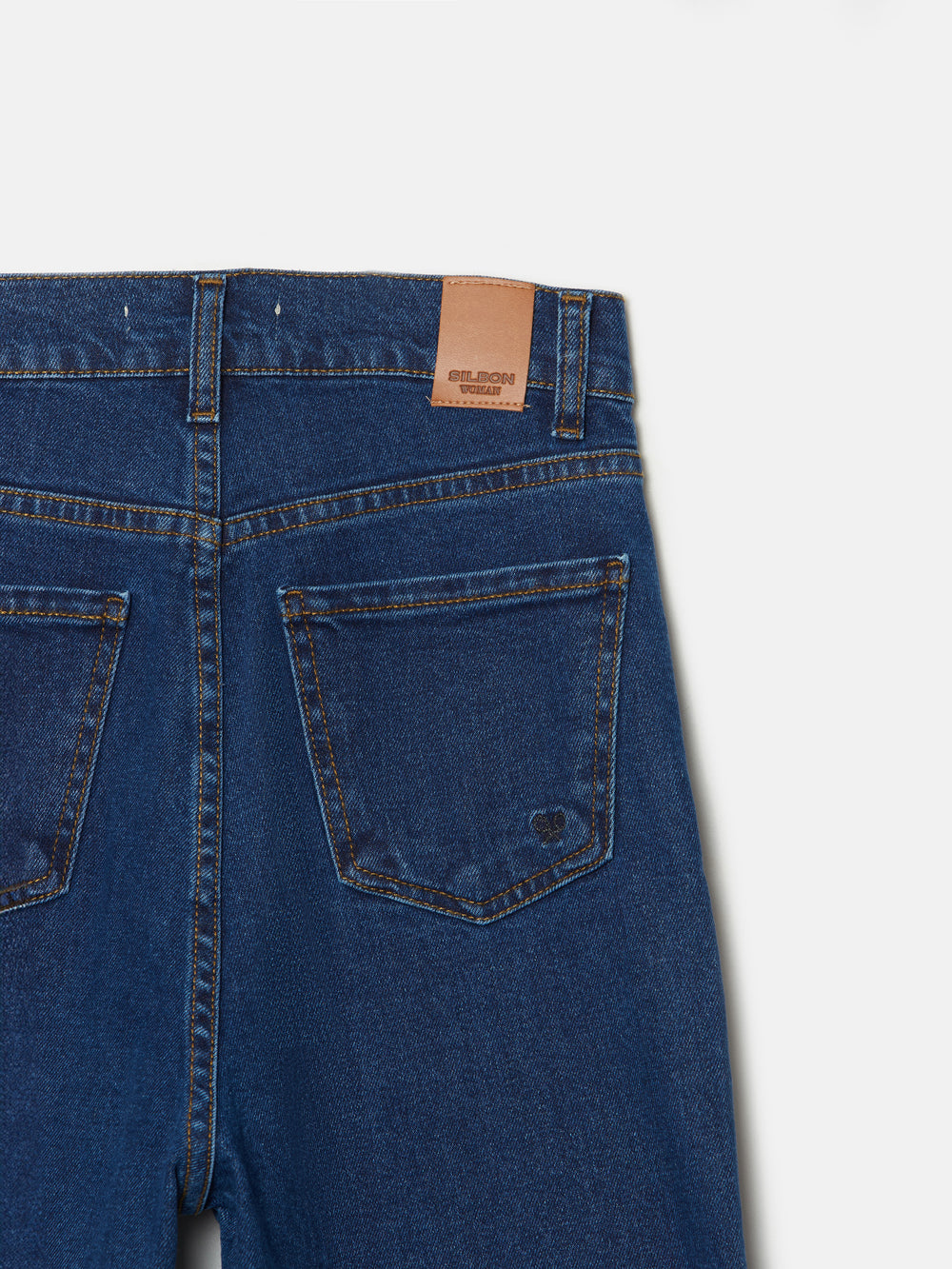 Flared denim trousers with pockets