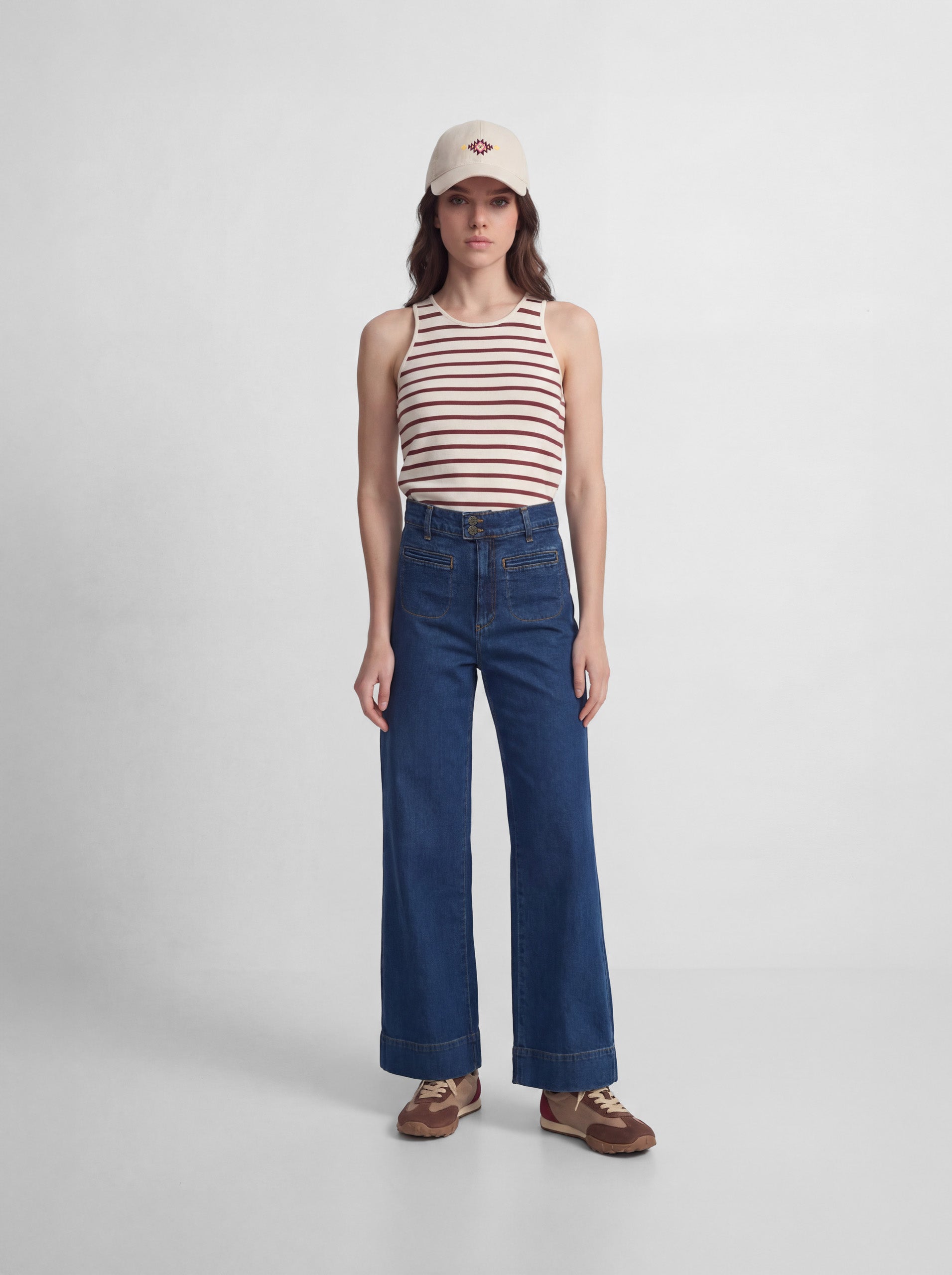 Flared denim trousers with pockets