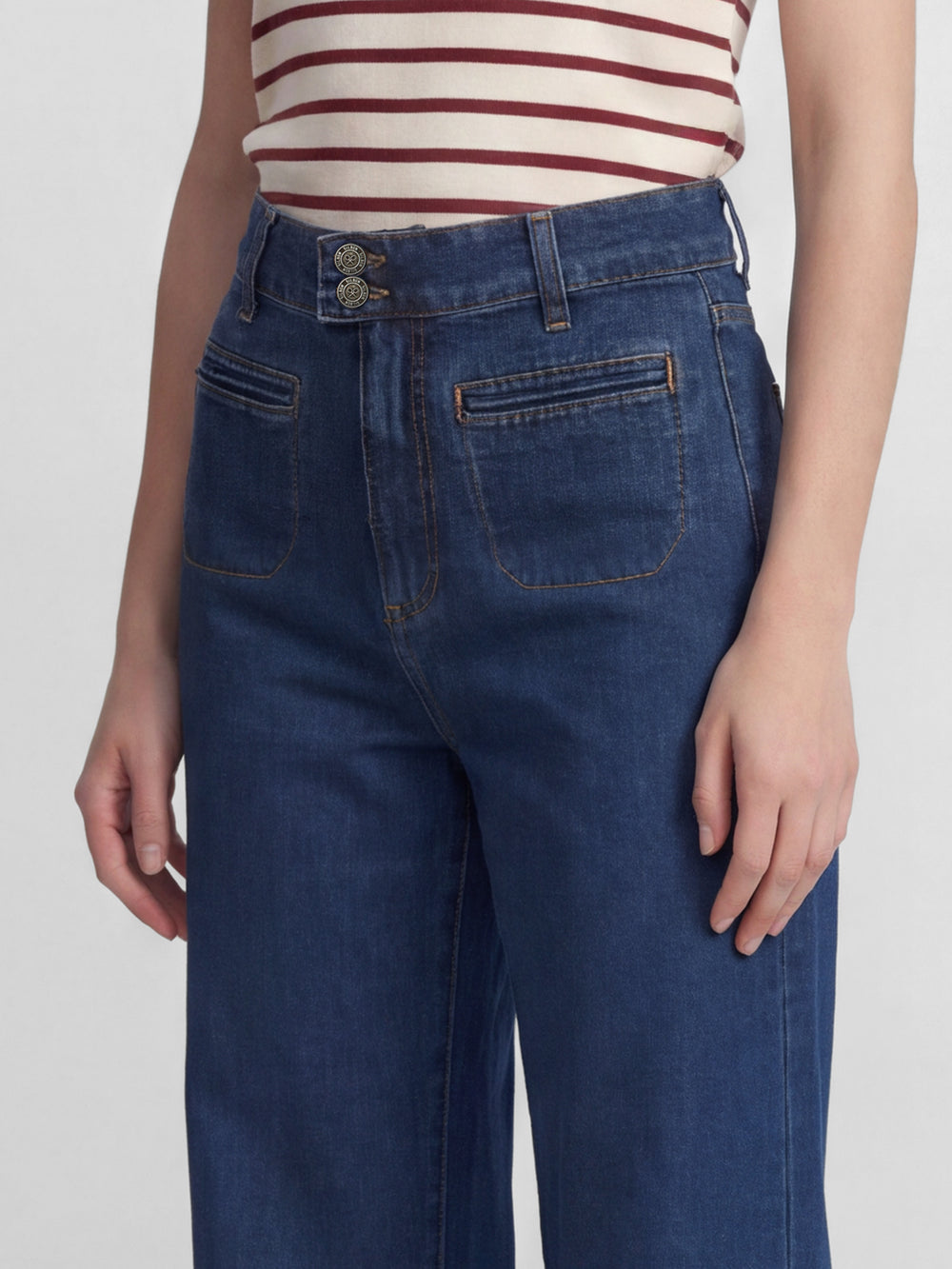 Flared denim trousers with pockets