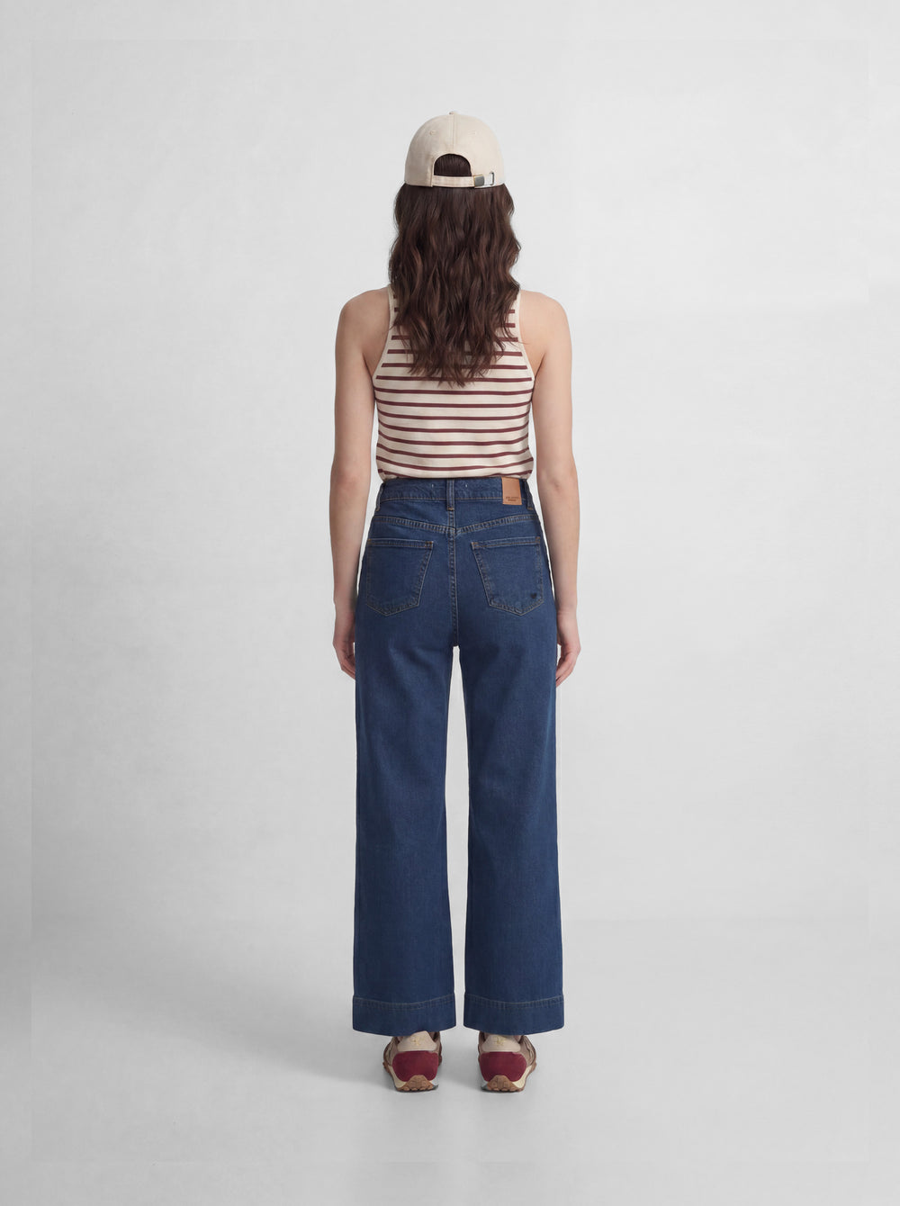 Flared denim trousers with pockets