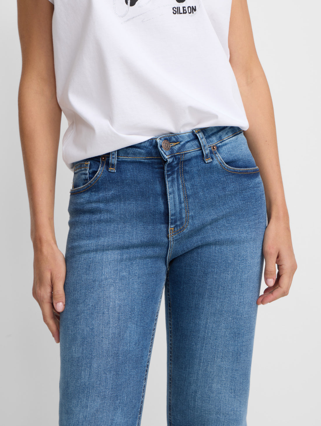 Calças de mulher slim fit ganga média