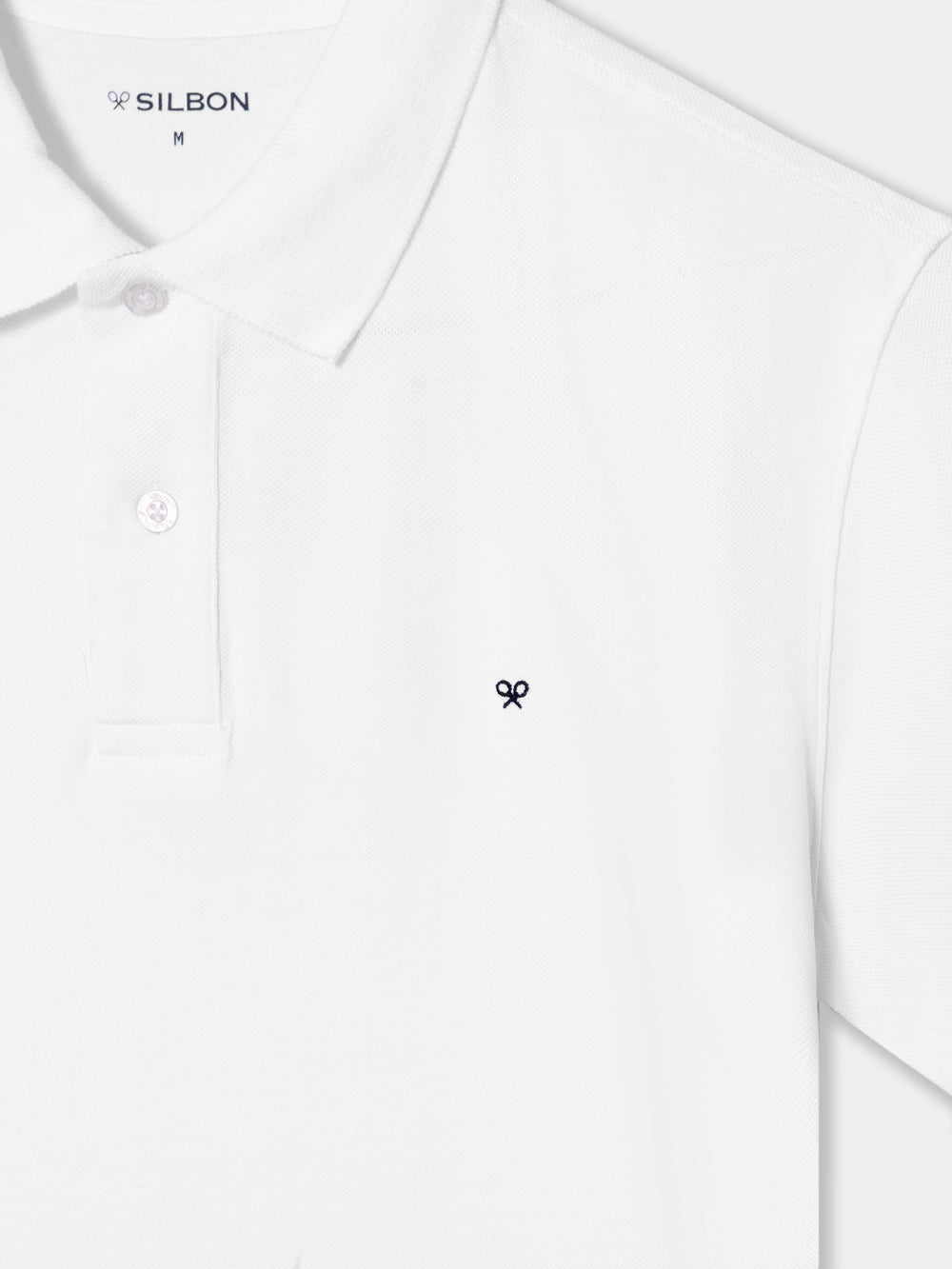 Polo clasico liso blanco