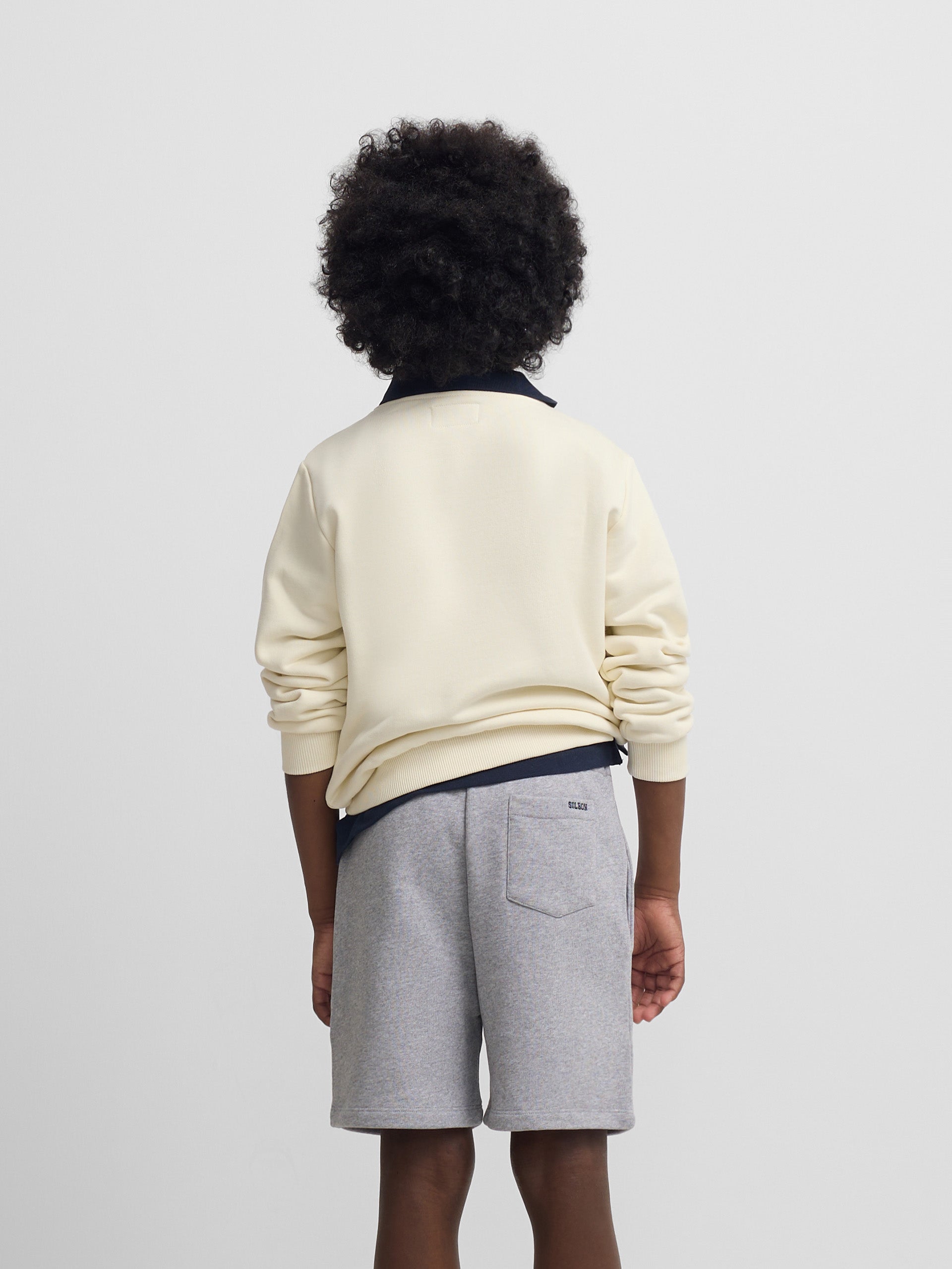 Sudadera kids raqueta media crema