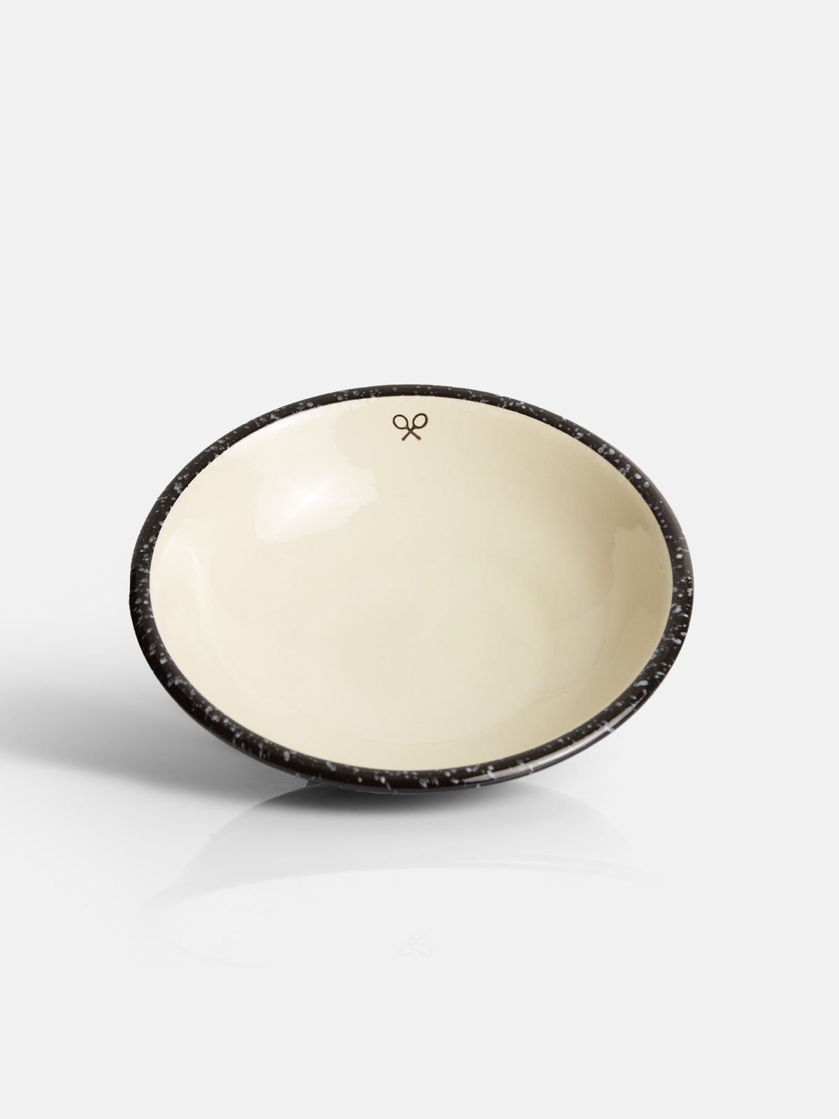 Assiette creuse en céramique émaillée bicolore