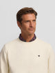Sudadera minilogo crema