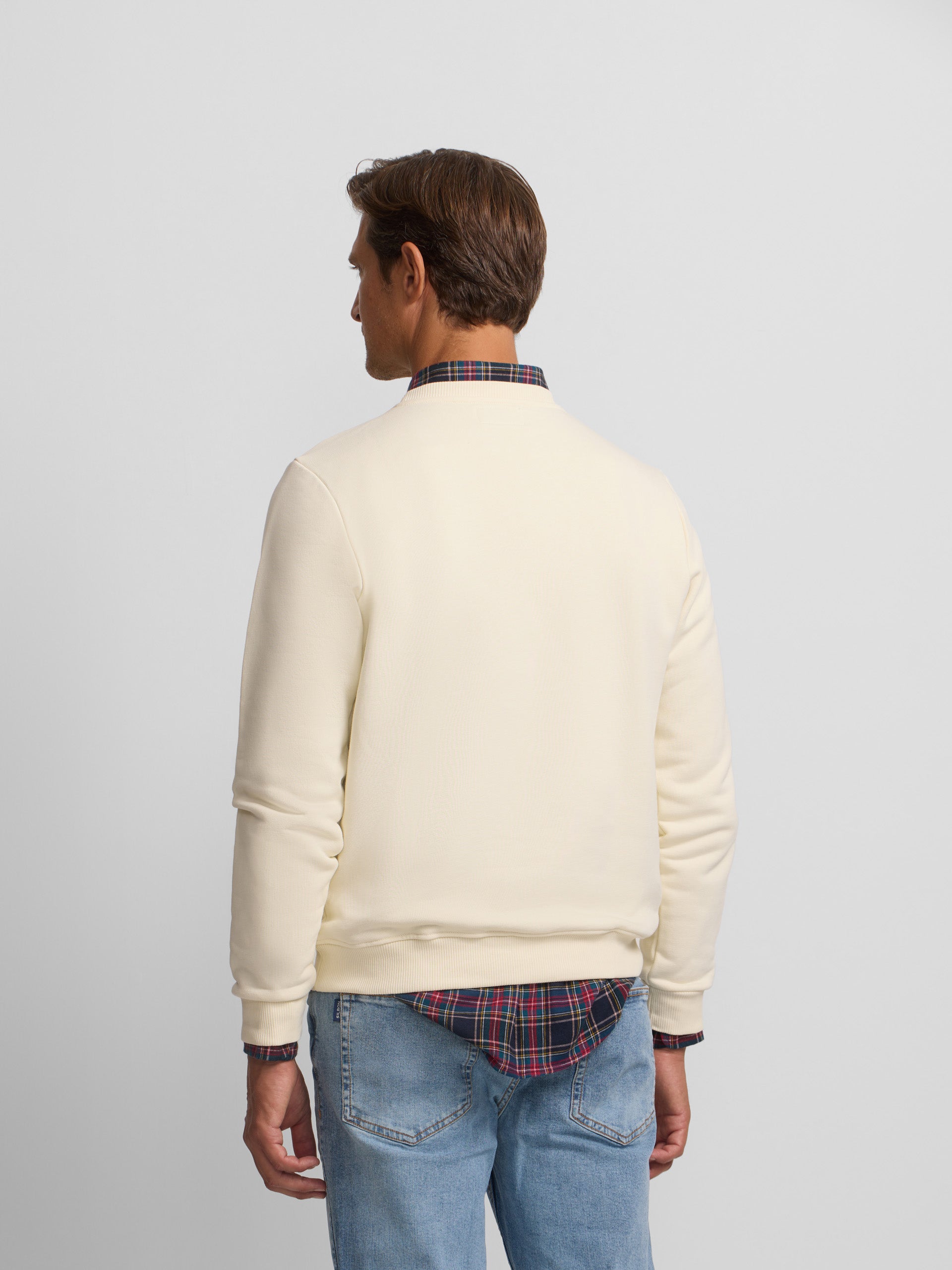 Sudadera minilogo crema