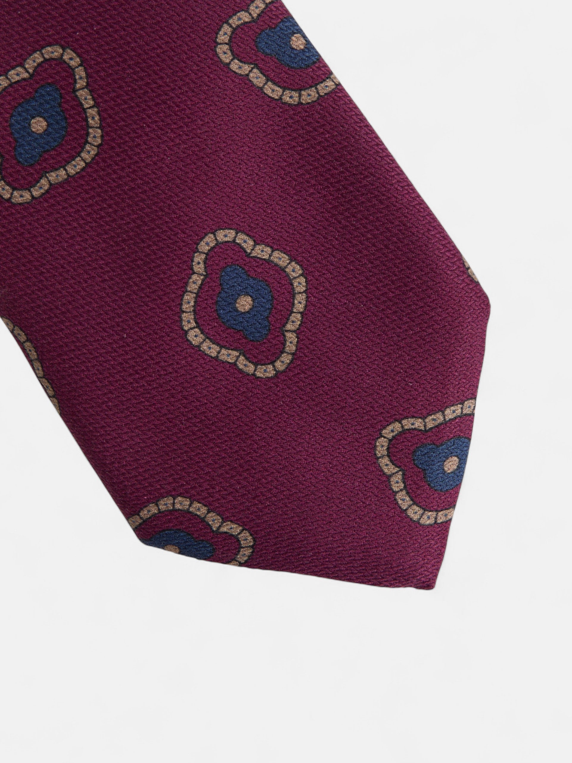 Burgundy tie with irregular geometric pattern
