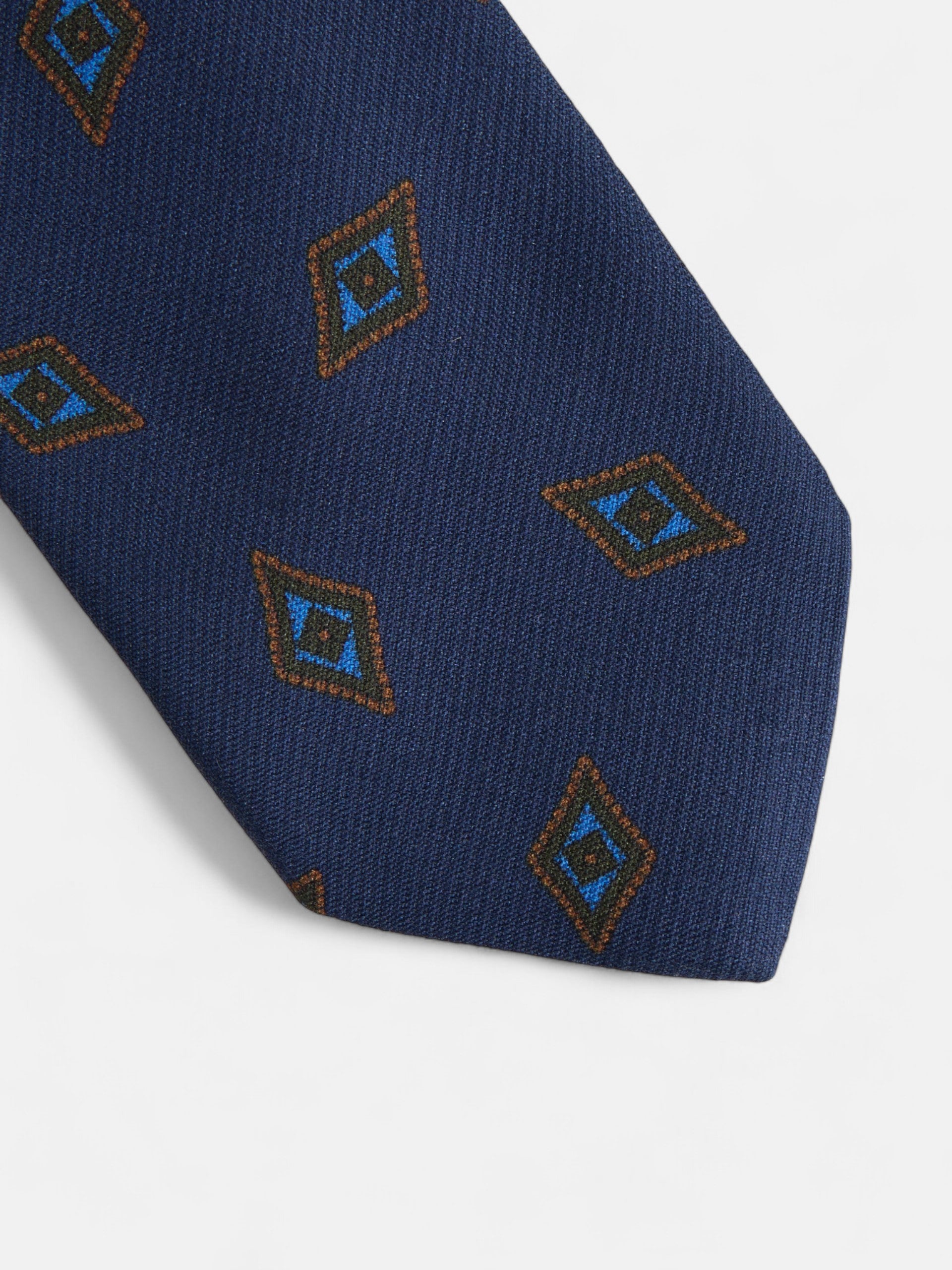 Corbata motivo rombo azul marino
