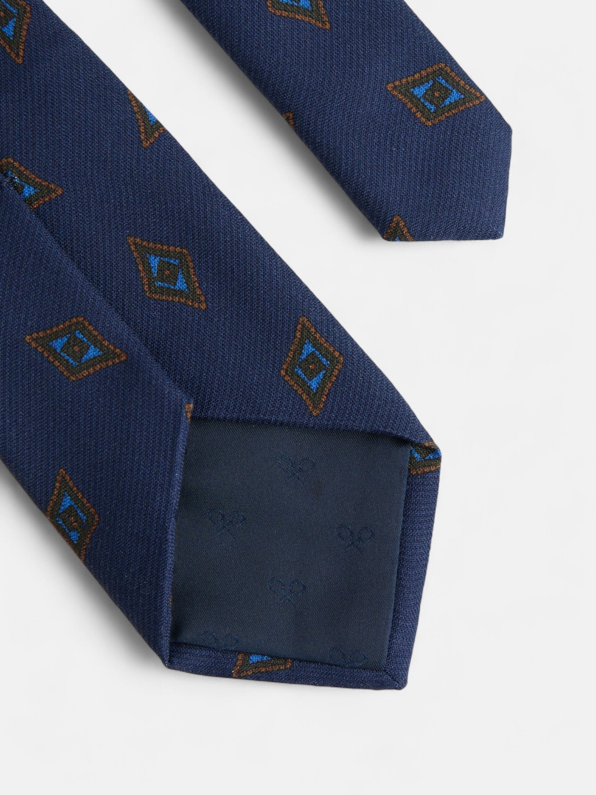 Corbata motivo rombo azul marino