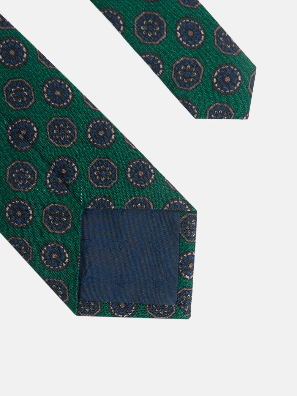 Green tie with English motifs